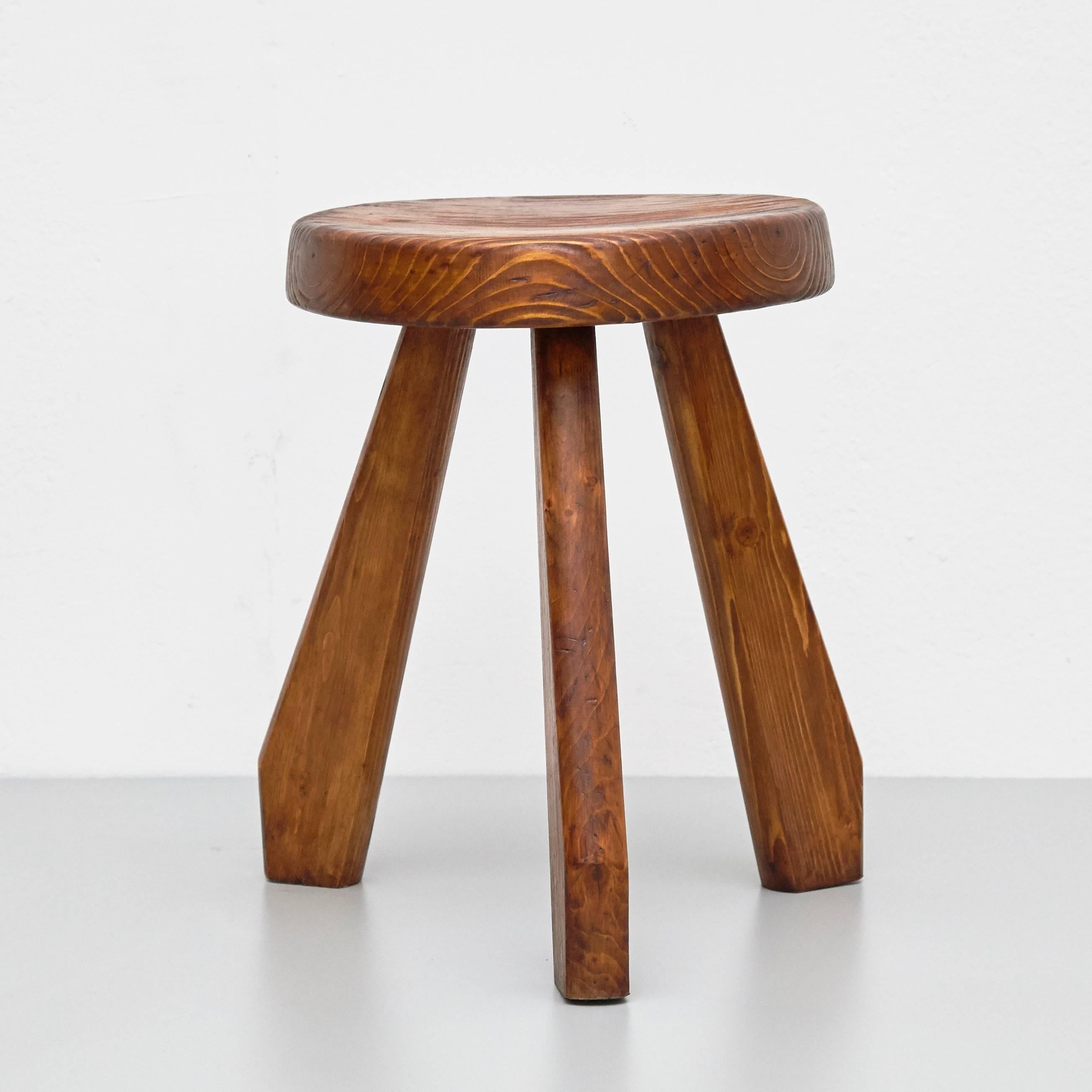 Stool, model Sandoz, designed by Charlotte Perriand, circa 1960.
Manufactured in France.
Pine wood.

In good original condition, with minor wear consistent with age and use, preserving a beautiful patina.

Charlotte Perriand (1903-1999). She