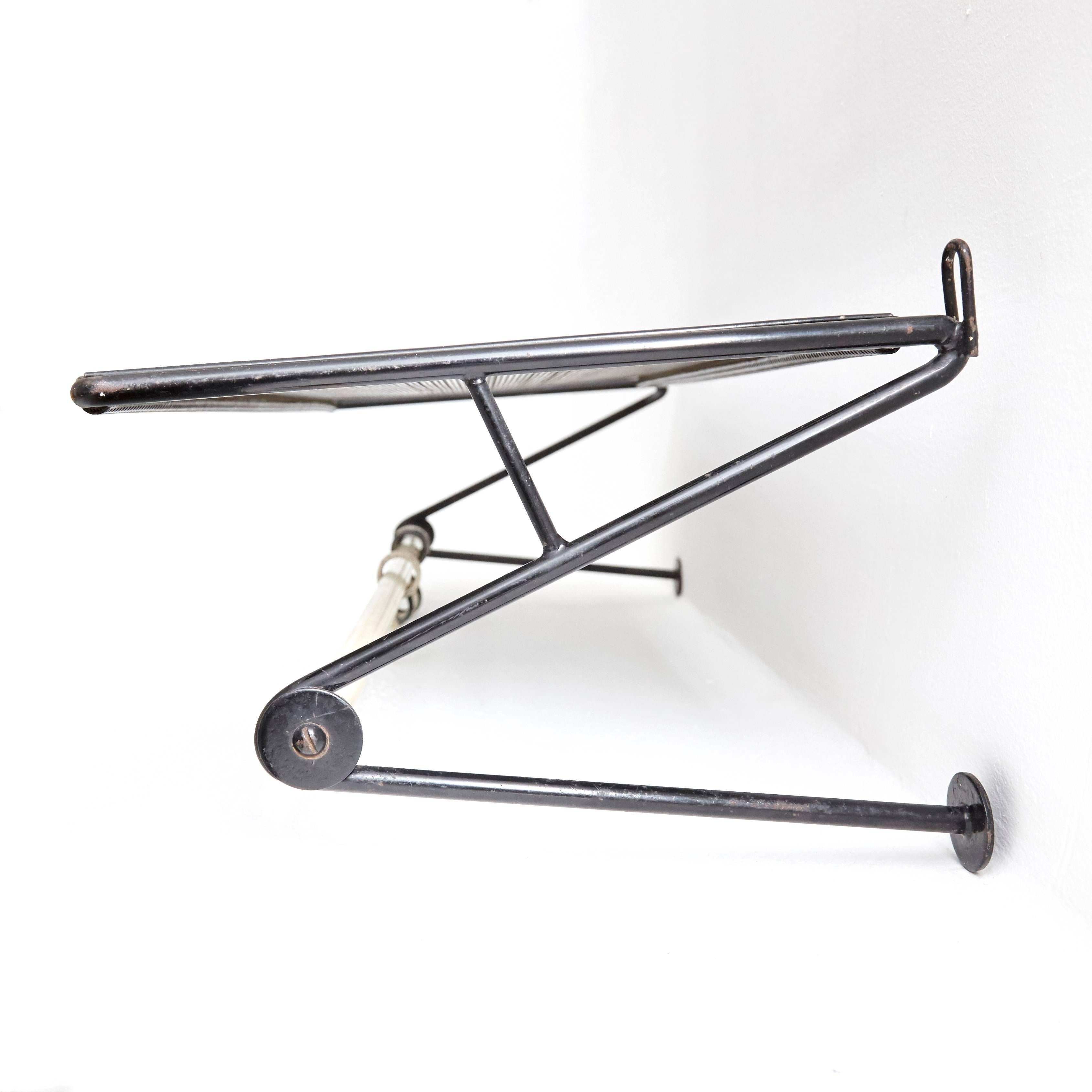 Coat rack designed by Mathieu Mategot, manufactured by Artimeta (Netherland), circa 1950.
Perforated, lacquered metal.

In good original condition, with minor wear consistent with age and use, preserving a beautiful patina.

Mathieu Mategot