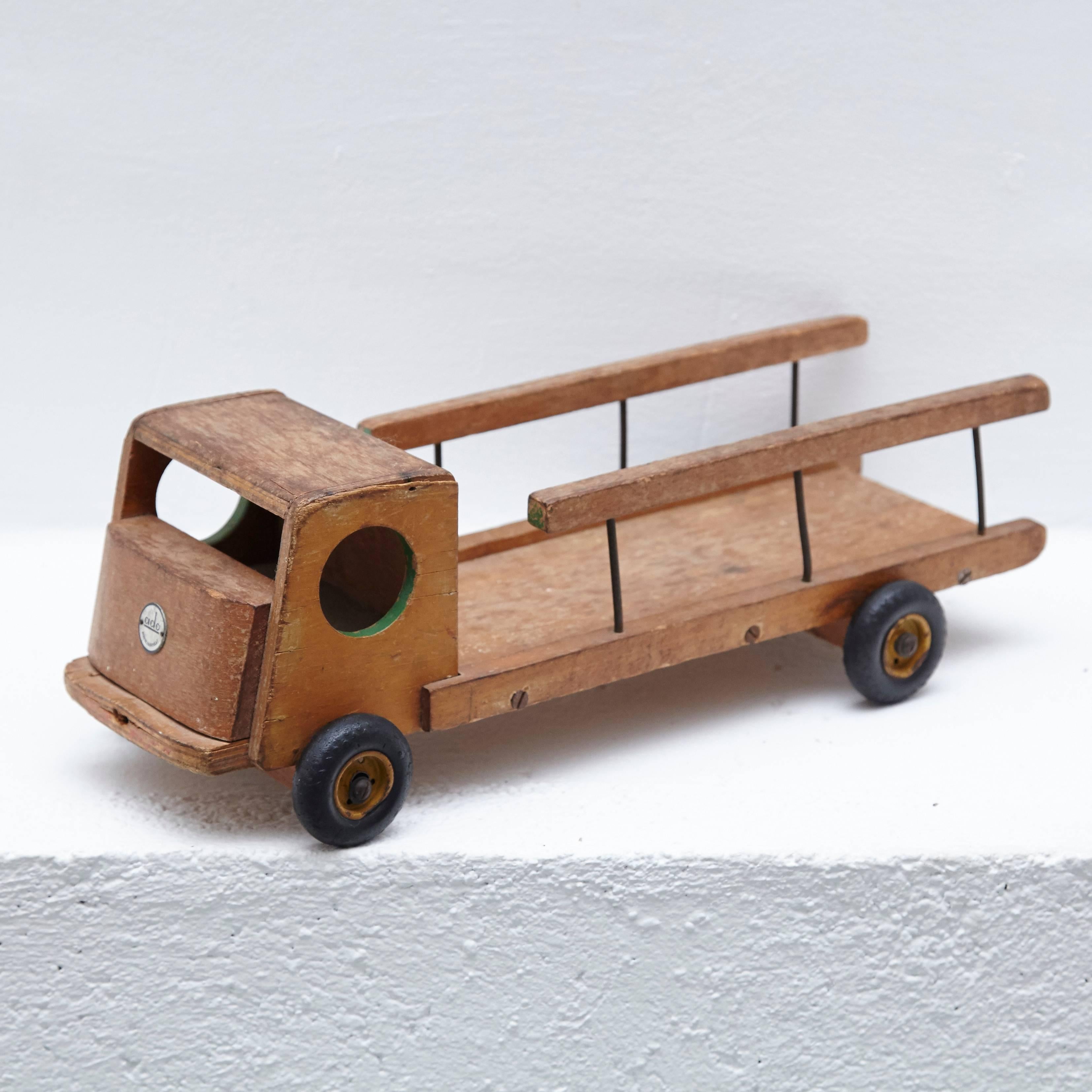 Very rare and early wooden toy truck designed by Ko Verzuu for Ado Holland in 1940.

In good original condition, with minor wear consistent with age and use, preserving a beautiful patina. 


Ko Verzuu
Utrecht 1901–1971
Construction