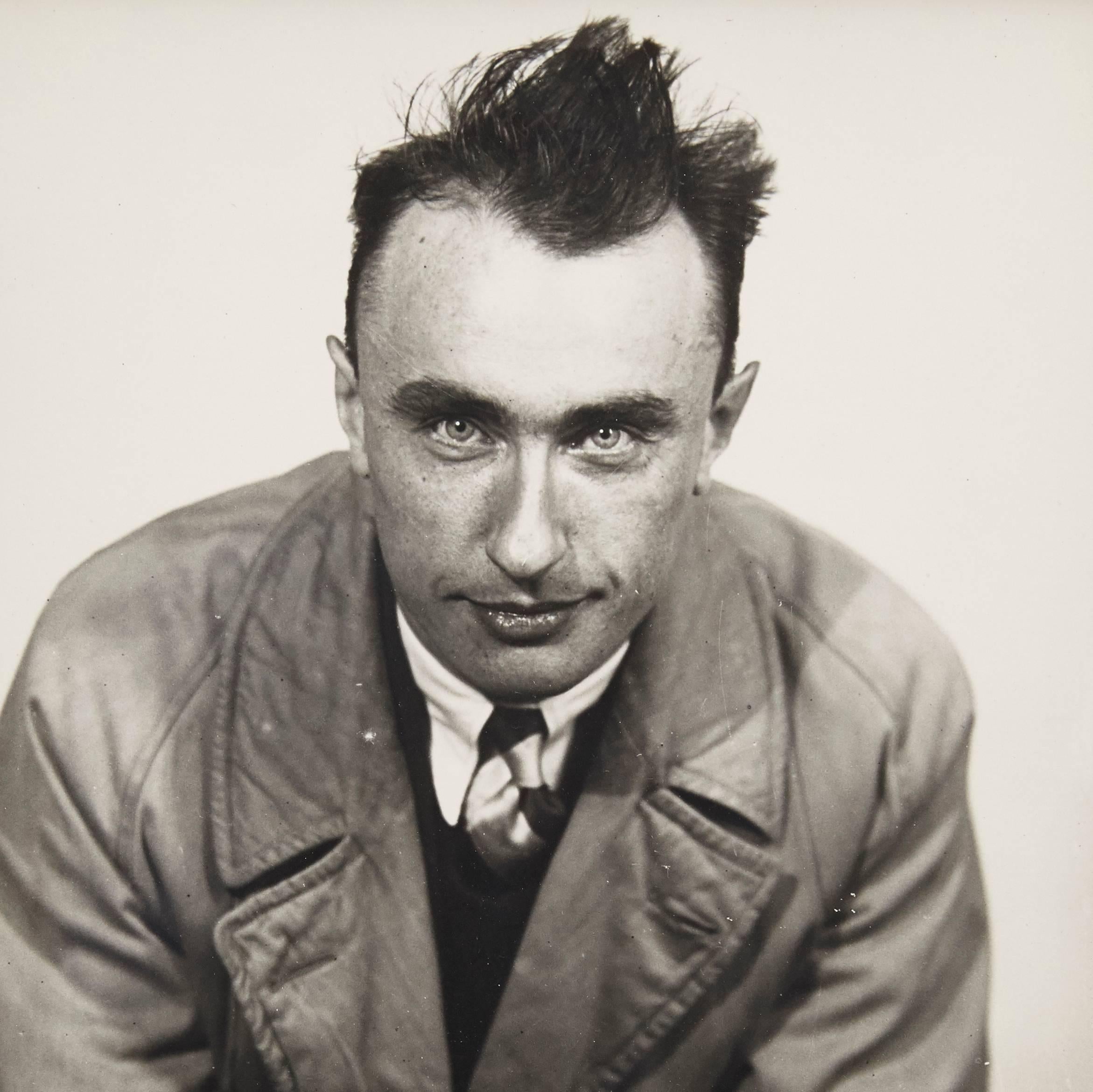 Portrait of Yves Tanguy photographed by Man Ray, circa 1930.

A posthumous print from the original negative in 1977 by Pierre Gassmann.

Gelatin silver bromide.

Born (Philadelphia, 1890 - Paris, 1976) Emmanuel Radnitzky, Man Ray adopted his