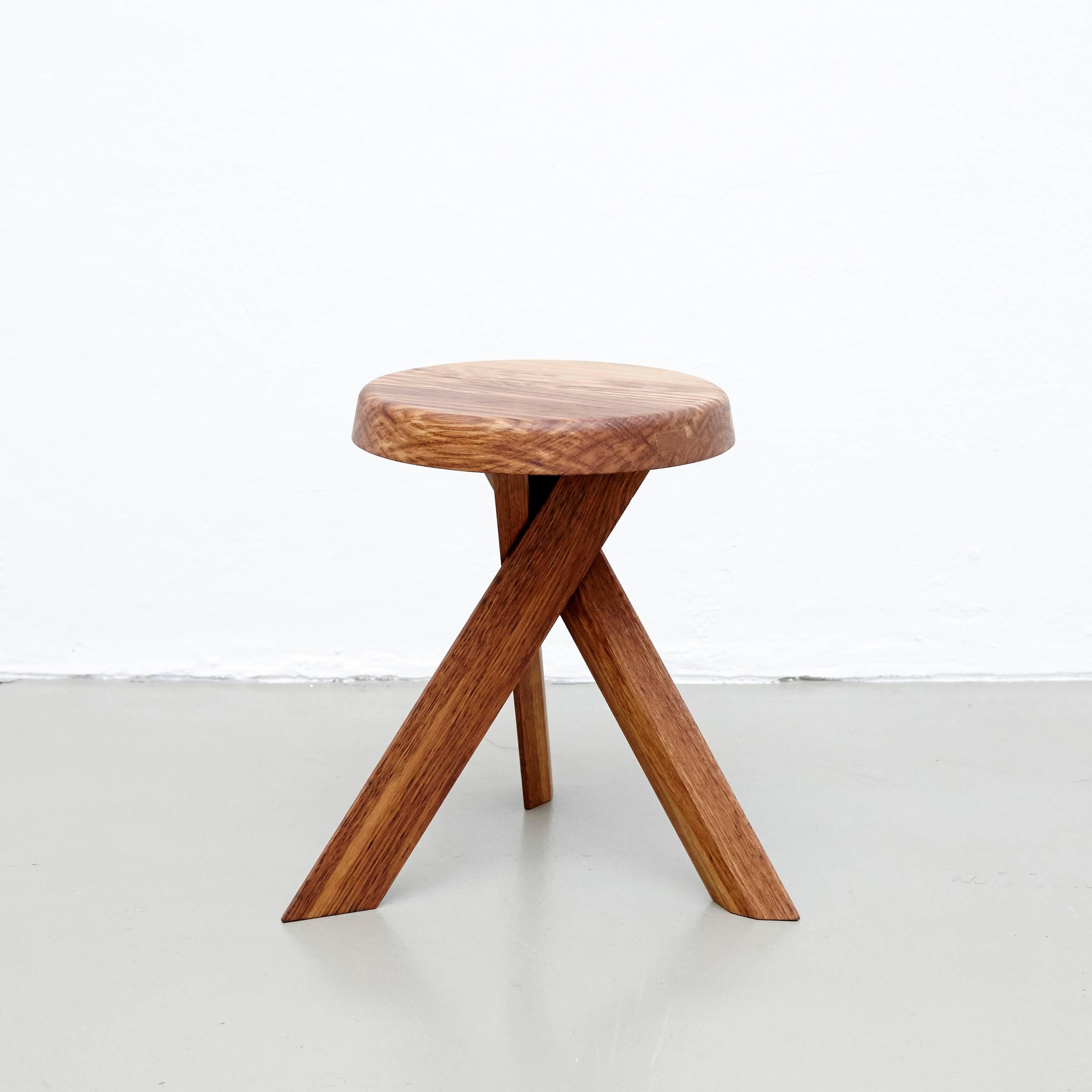 S 31 a stool designed by Pierre Chapo, circa 1960.
Manufactured by Chapo Creation in France, 2015.
Solid oakwood.

In good original condition, with minor wear consistent with age and use, preserving a beautiful patina.

Pierre Chapo is born in