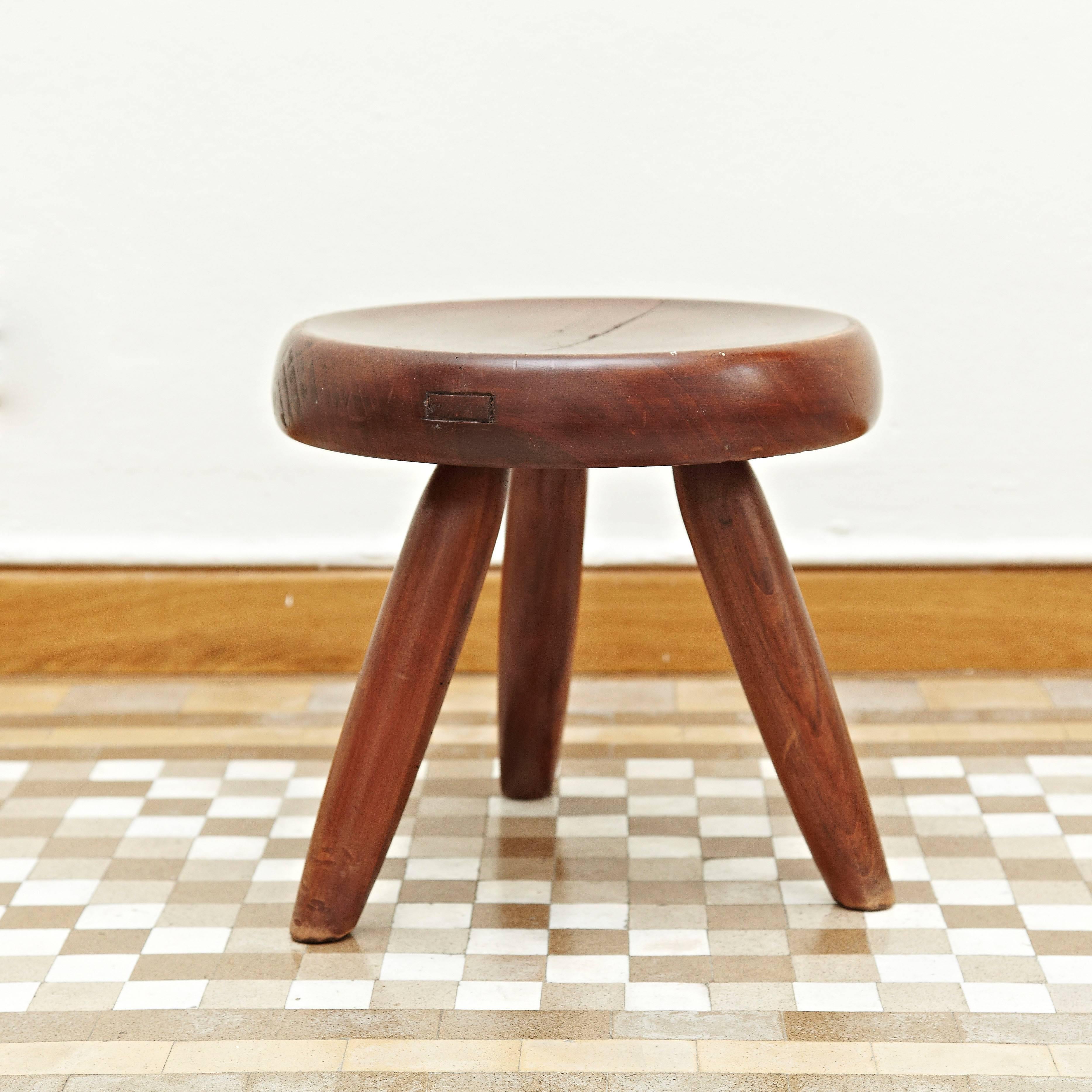 Stool designed by Charlotte Perriand around 1950, manufactured in France.
Wood.

In good original condition, with minor wear consistent with age and use, preserving a beautiful patina.

Charlotte Perriand (1903 - 1999) She was born in Paris in