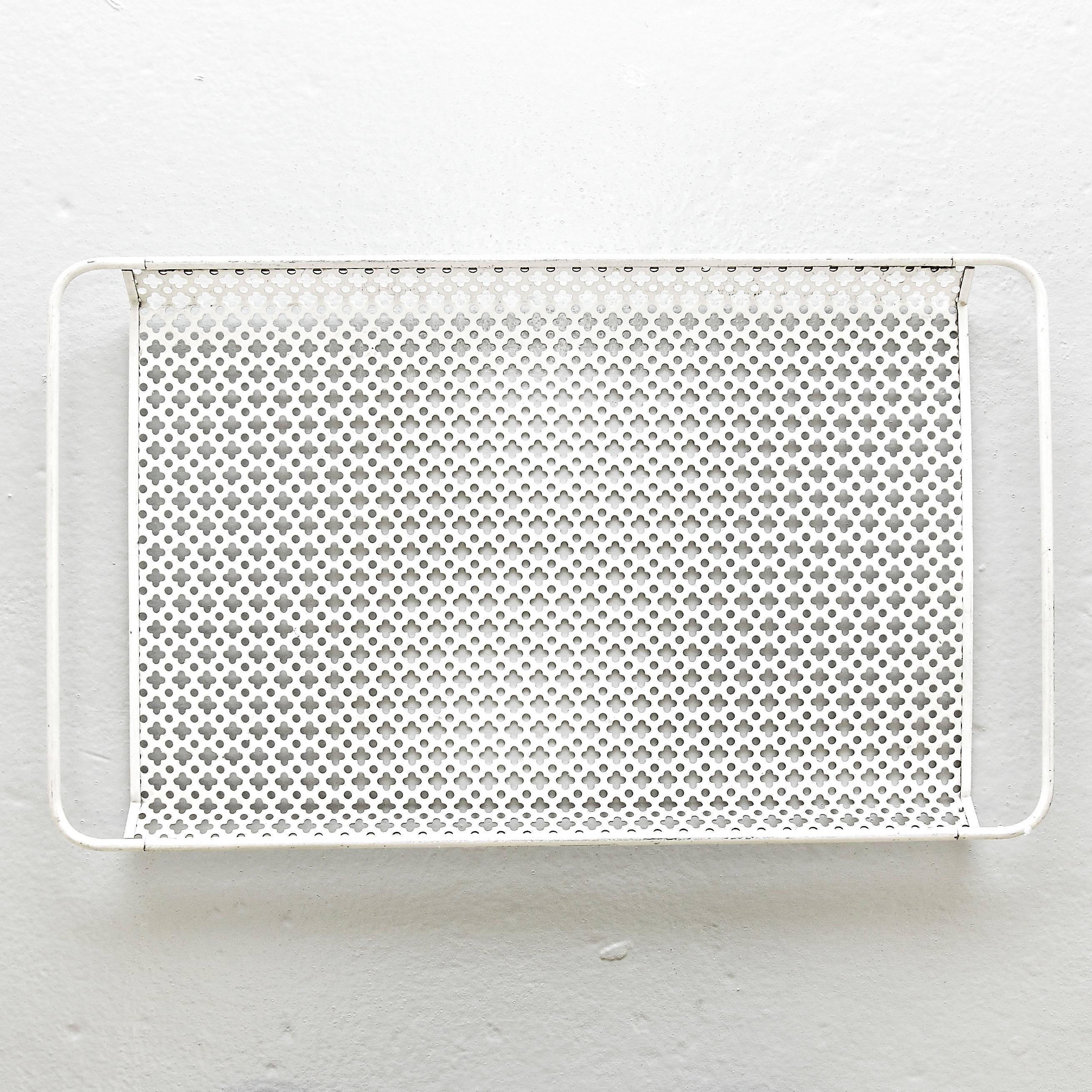 Enameled metal Tray designed by Mathieu Matégot.
Manufactured by Ateliers Matégot (France), circa 1950.
Lacquered perforated metal with original paint.

In good original condition, with minor wear consistent with age and use, preserving a