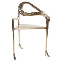 Sillón «Leda» de Salvador Dalí, escultura en latón pulido de BD Barcelona
