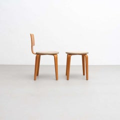 Ensemble composé d'une chaise et d'un tabouret en contreplaqué et de tissu d'ameublement de Cor Alons, vers 1950
