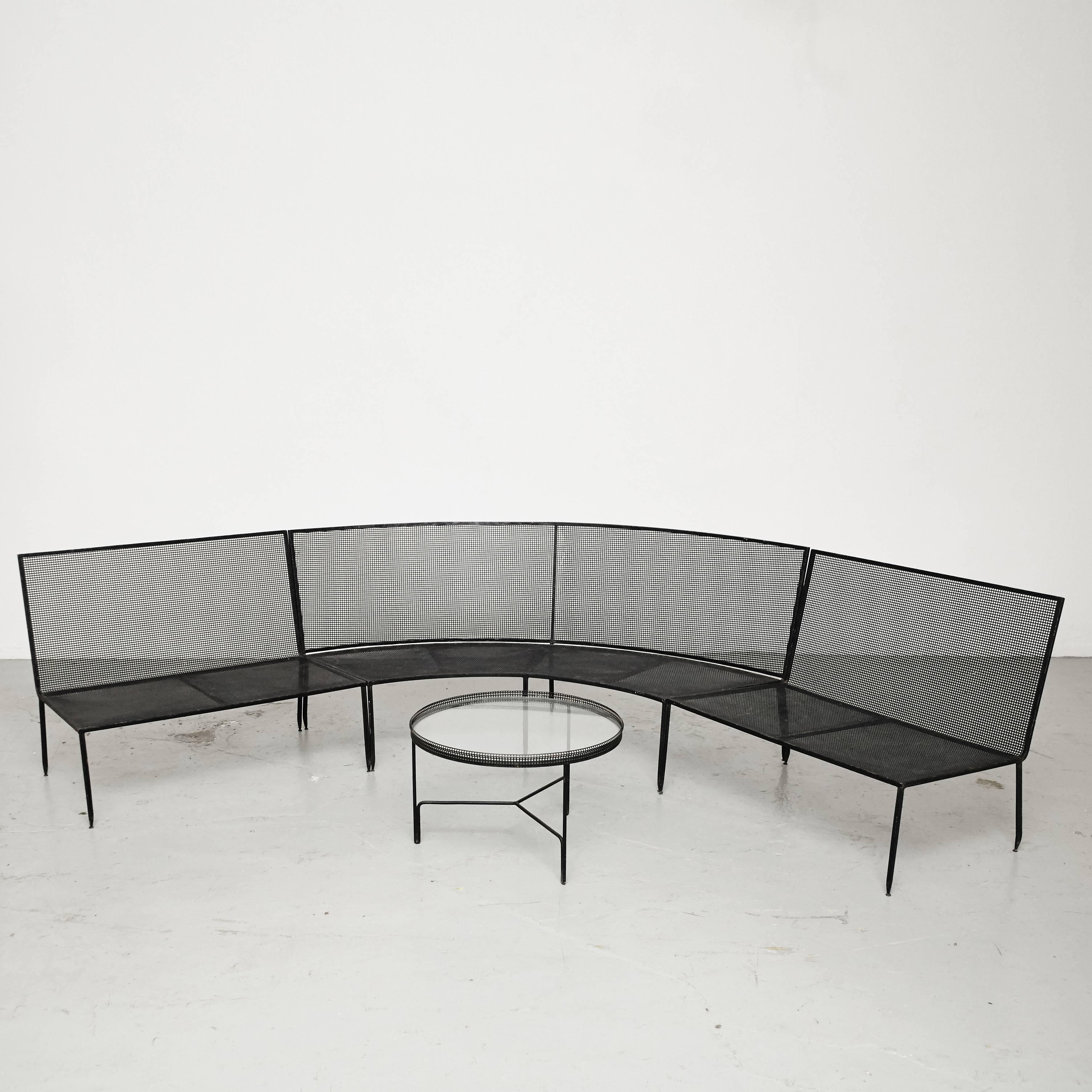 Large sofa and coffee table designed by Mathieu Mate´got, manufactured by Ateliers Mate got in France, circa 1950.

The large sofa consists out of three separate parts that allow different shapes and designs.

In good original condition with