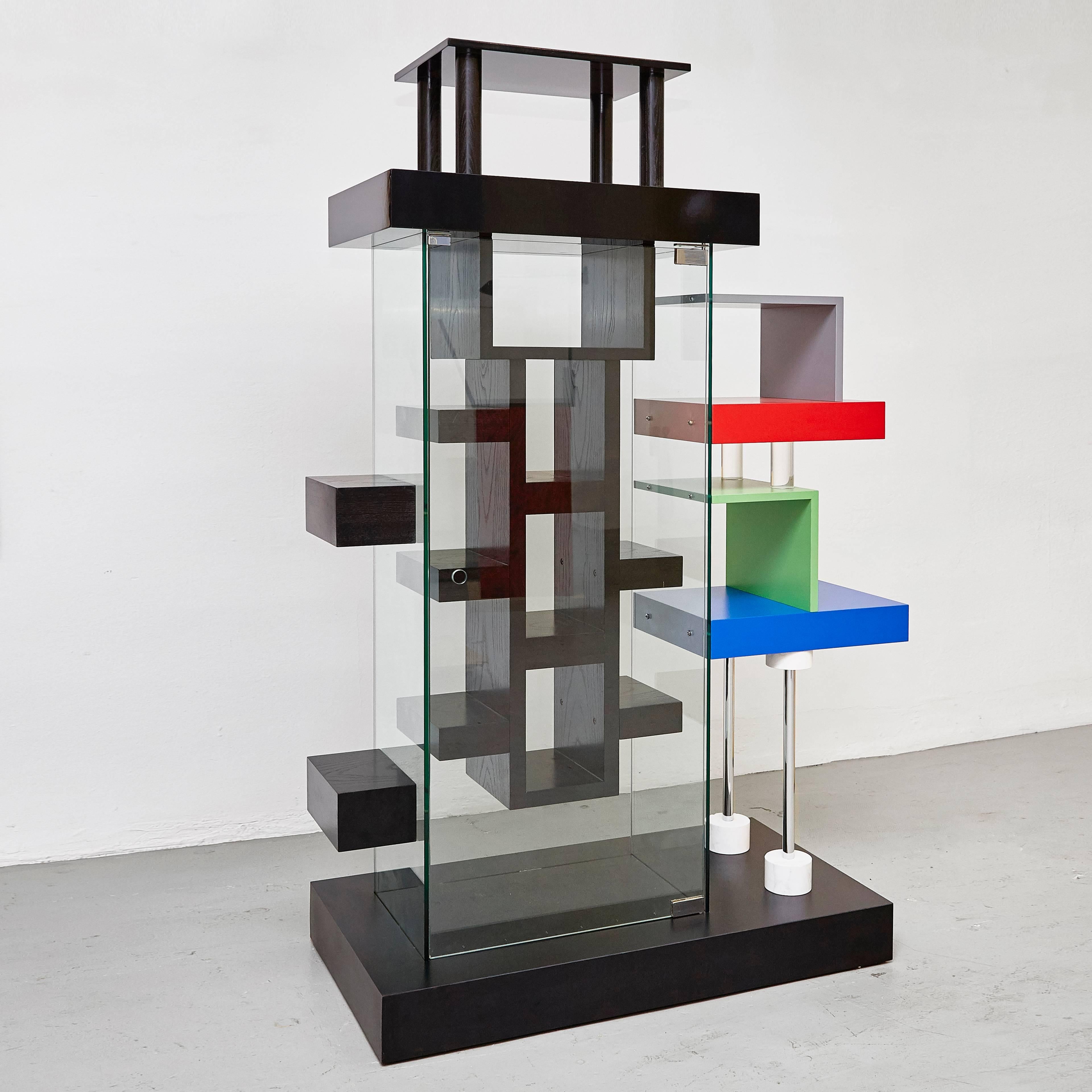 Showcase coming back from Madras designed by Ettore Sottsass.

Marble, wood, metal, glass. 

In original condition, with wear consistent with age and use, preserving a beautiful patina. It has thin scratches and small damages on the structure