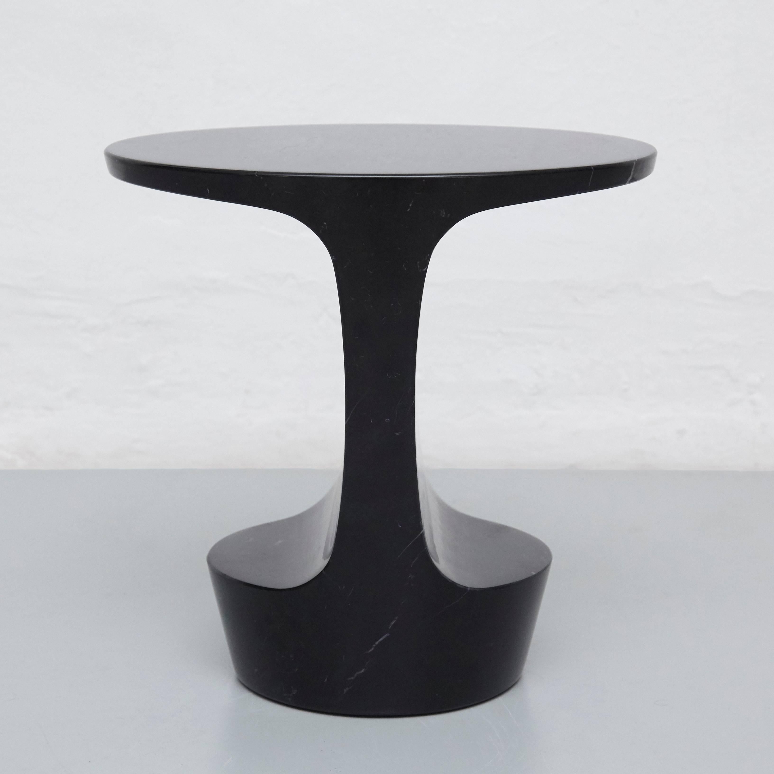 Side table designed by Adolfo Abejon.

Material:
Marquina marble or Carrara marble.

Finish:
Artisan polished.

Colors:
Marquina black or Carrara white.

Dimensions:
42 × 32 × 43 cm (L × W × H).

The Marble of the piece will be different for each