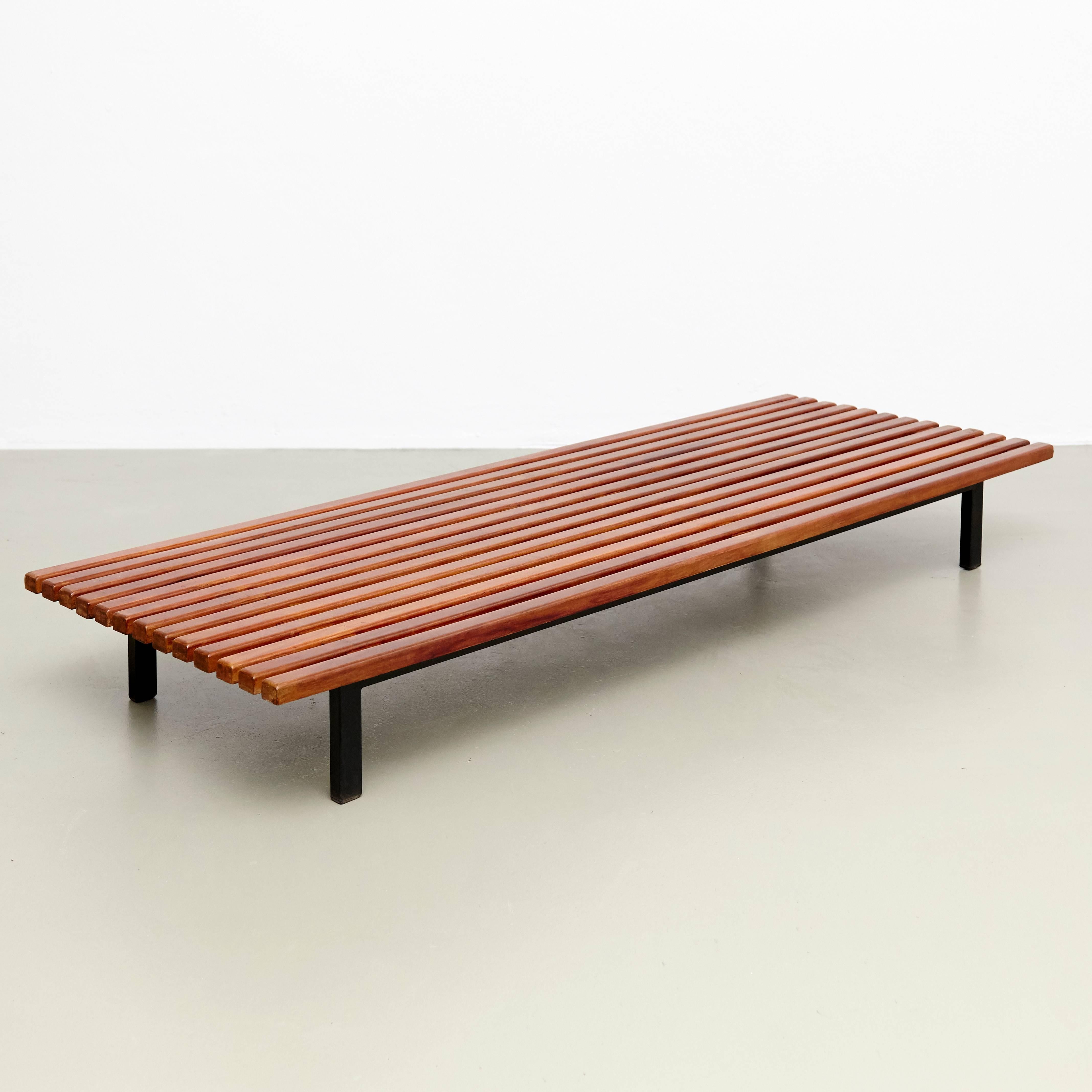 Bench designed by Charlotte Perriand, circa 1950.
Manufactured by Steph Simon (France) circa 1950.
Wood, lacquered metal frame and legs.

Provenance: Cansado, Mauritania (Africa).

In good original condition, with minor wear consistent with