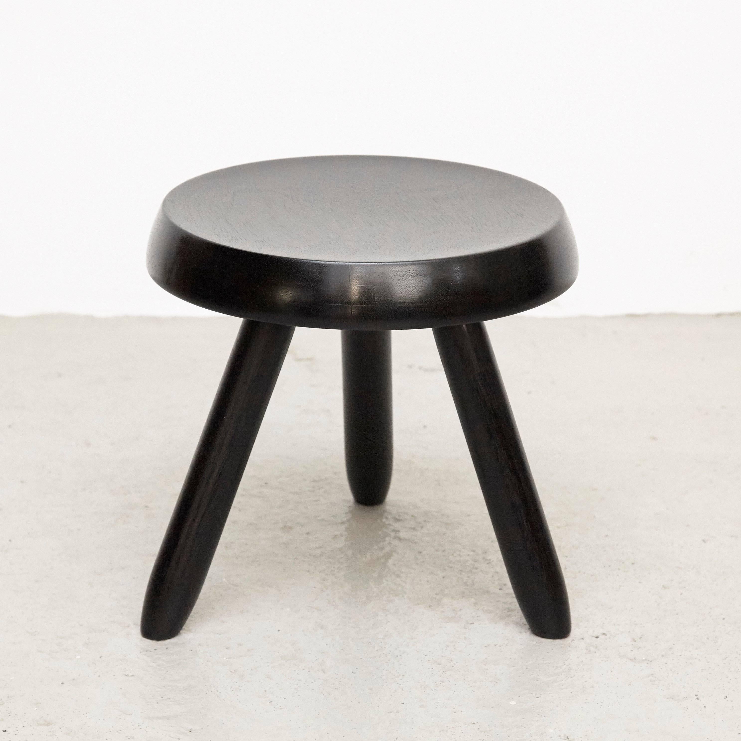 Stool designed in the style of Charlotte Perriand, made by unknown manufacturer.

In good original condition, preserving a beautiful patina, with minor wear consistent with age and use. 

Charlotte Perriand (1903-1999) She was born in Paris in