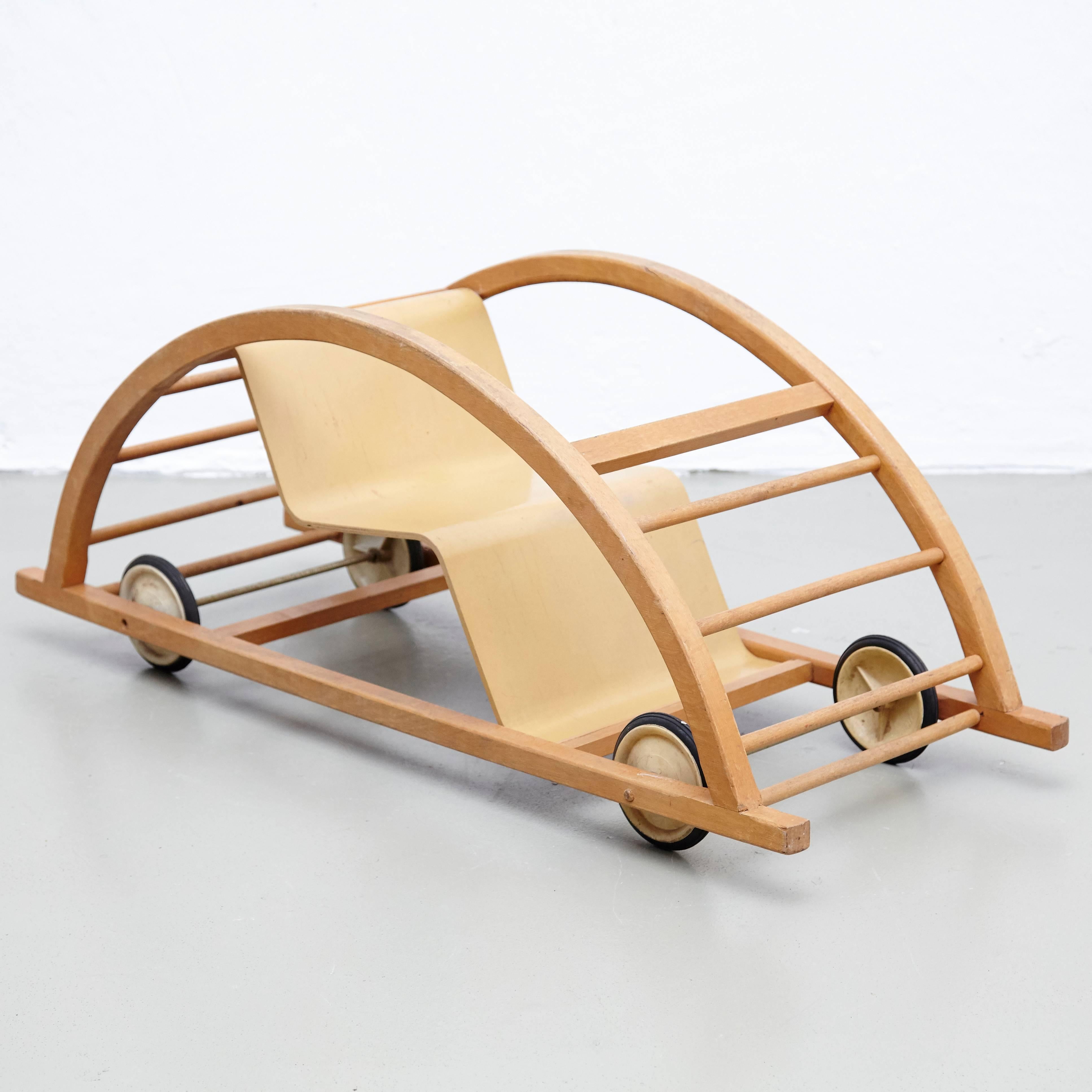 Rocking car, aka "der Schaukelwagen", designed by Hans Brockhage and Erwin Andrä, circa 1960.
Manufactured by Siegfried Lenz.

In good original condition, with minor wear consistent with age and use.

During they studies at the Academy of