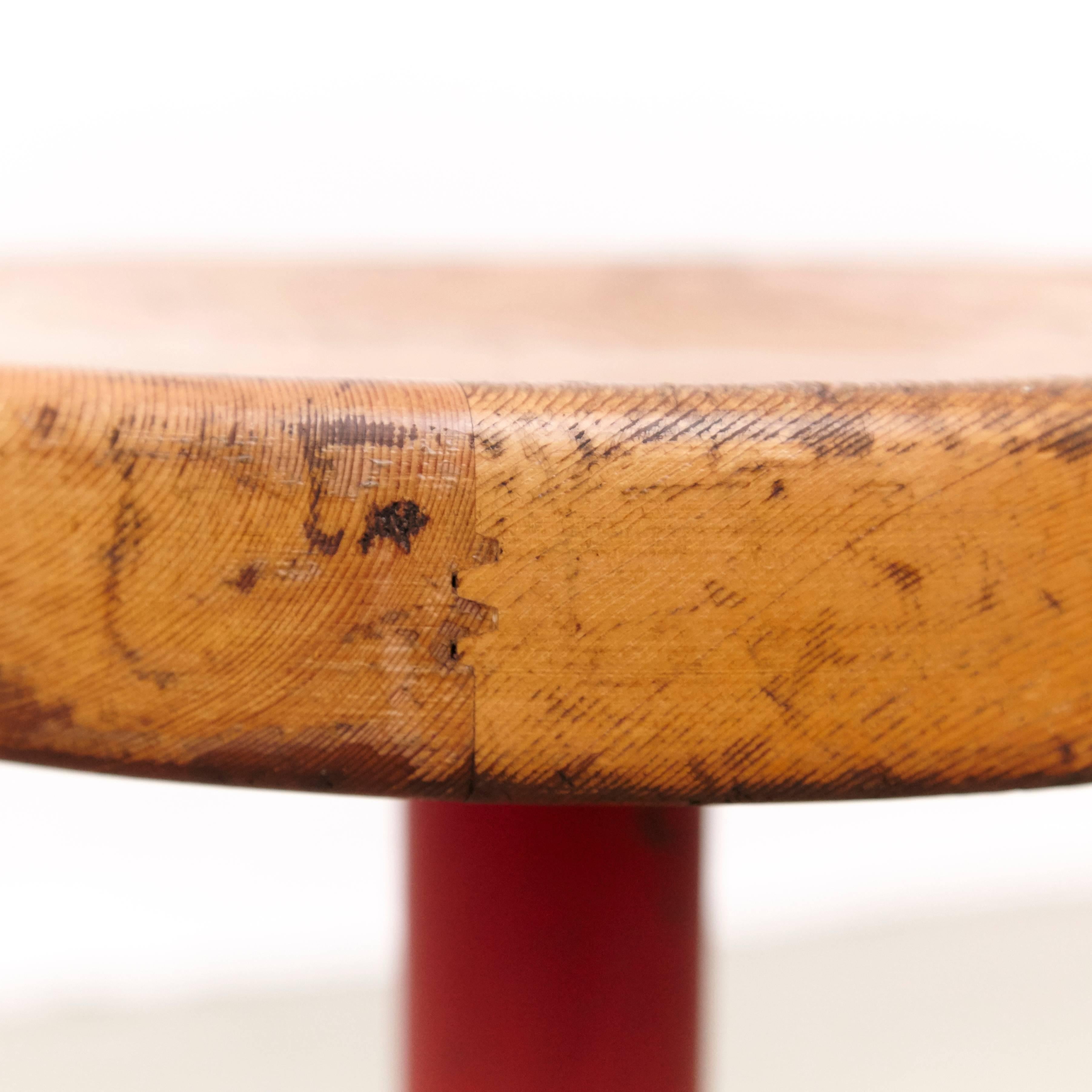 Rare stool designed by Charlotte Perriand, circa 1960 for Les Arcs.
Manufactured in France.
Lacquered metal base, pine wood seat.

In good original condition, preserving a beautifull patina.

Charlotte Perriand (1903-1999) She was born in