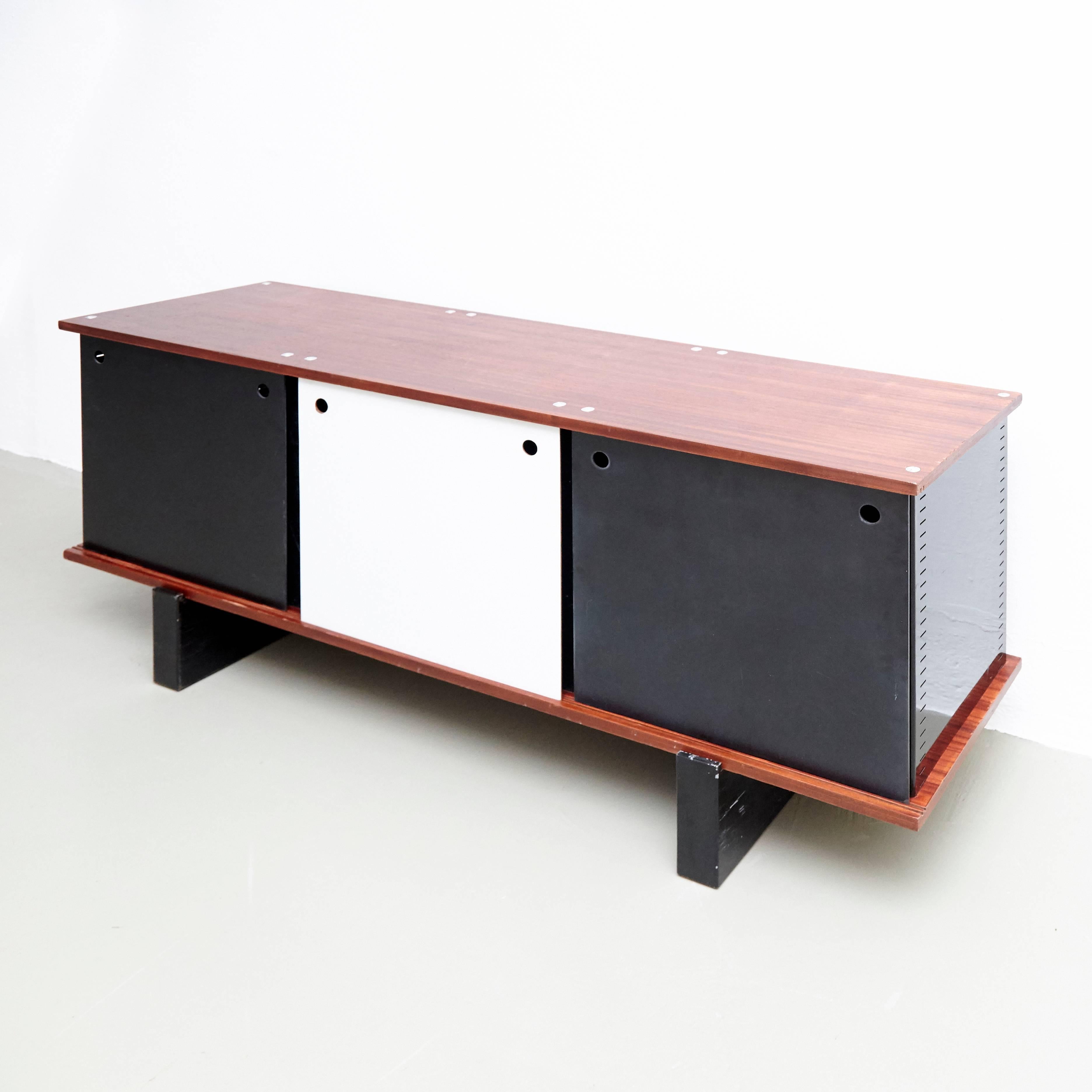 Three doors sideboard designed by Charlotte Perriand for Cité Cansado, circa 1950.

Edited by Galerie Steph Simon.
Provenance: Cansado, Mauritania (Africa).

In good original condition, with minor wear consistent with age and use, preserving a