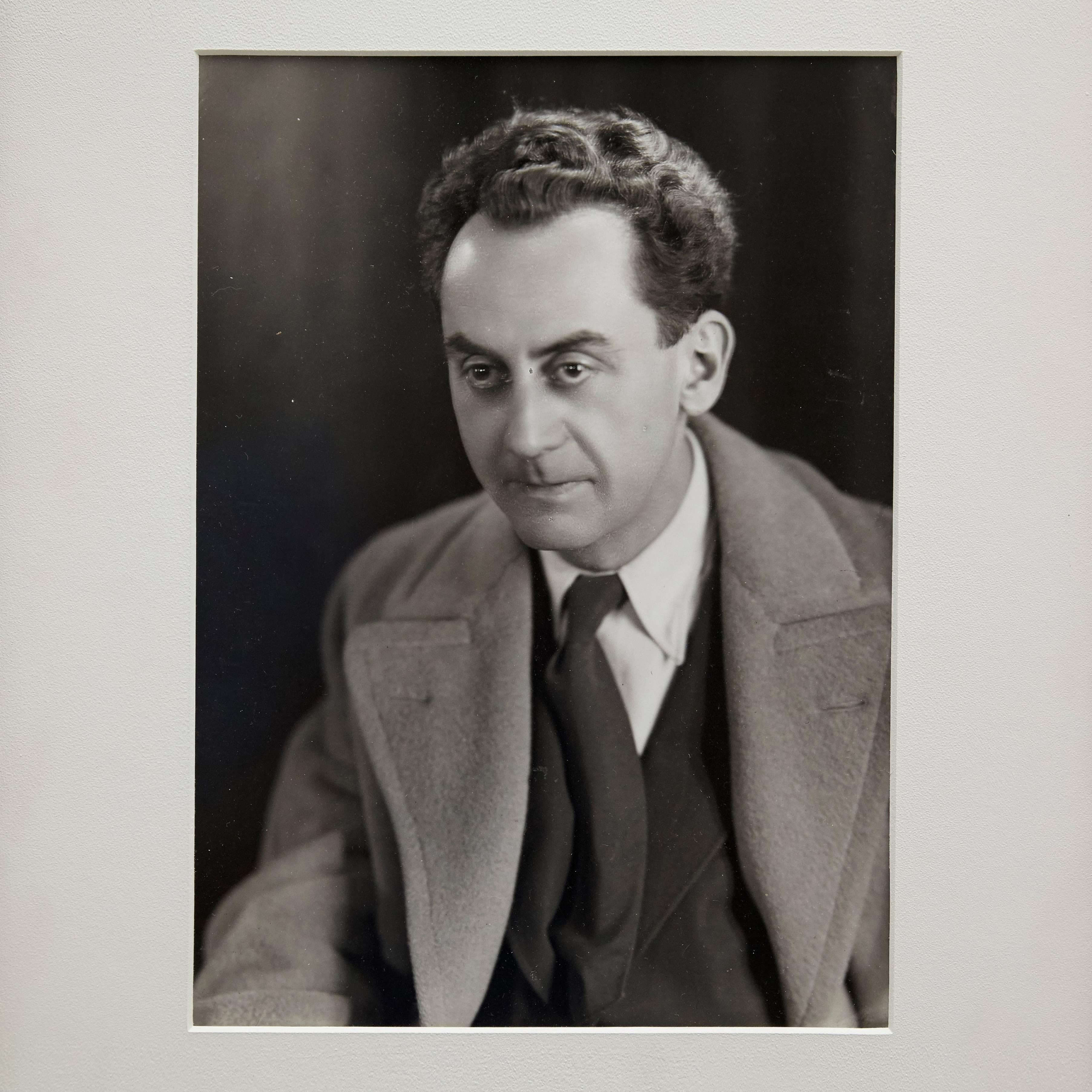 Selfportrait photographed by Man Ray.

A posthumous print from the original negative around 1970 by Pierre Gassmann. Gelatin silver bromide.

Framed in a 19th century frame with museum glass.

Stamped in the back with Man Ray Paris Stamp and Pierre