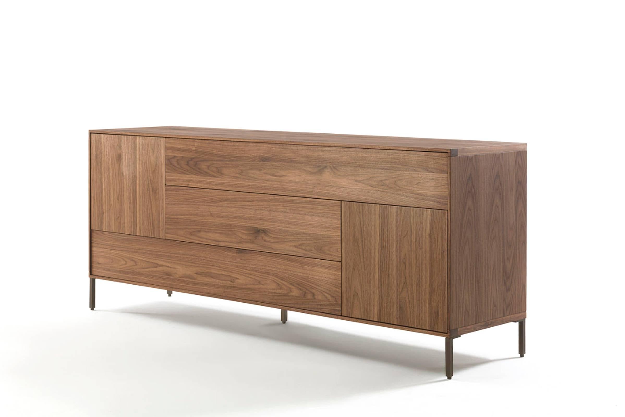Sideboard Barbara in massive natural walnut with
three drawers and two doors. Opening with push-pull system.
Available in cherrywood, maple or oak, price: 10700,00€.
