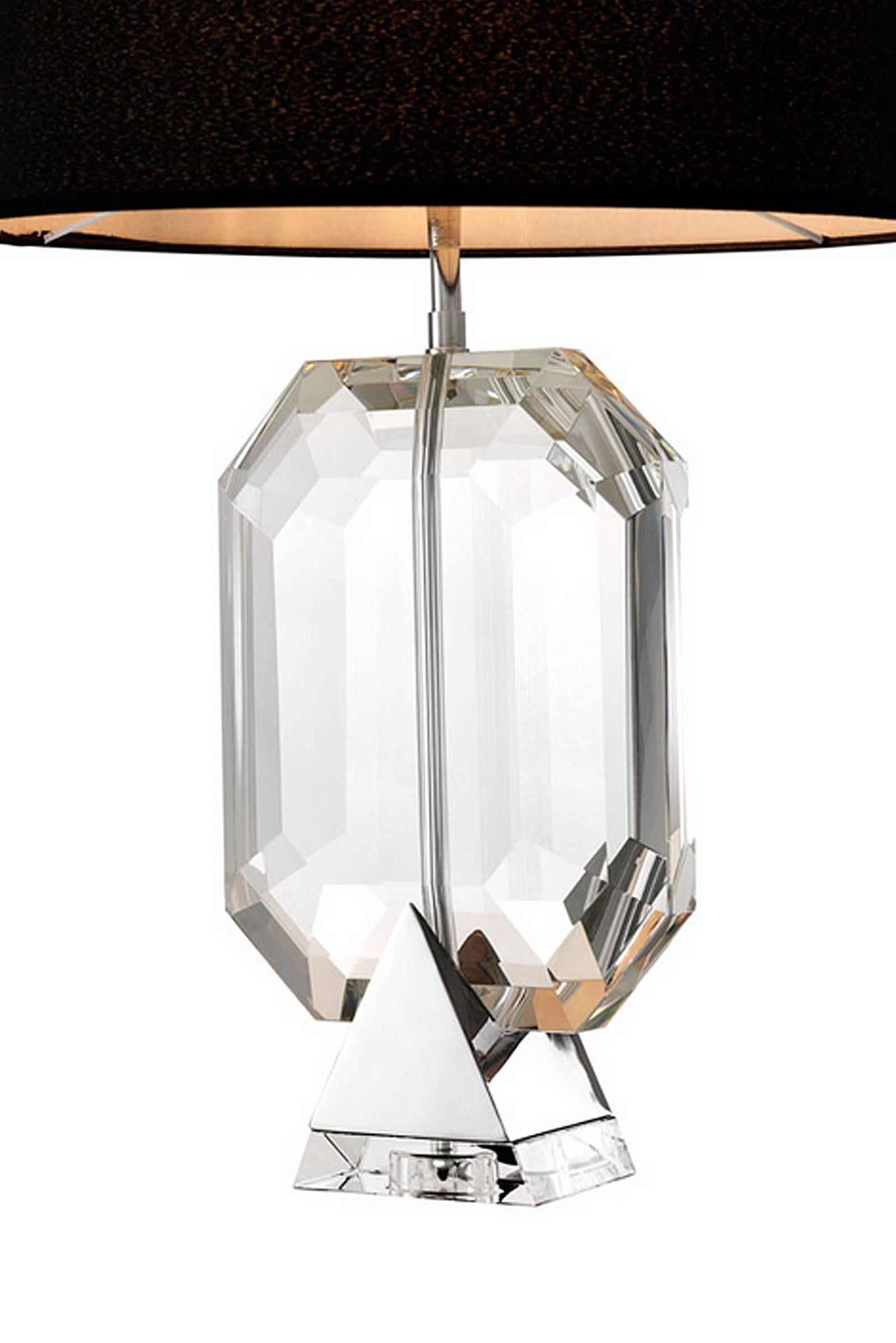 Table lamp in crystal glass and nickel finish.
