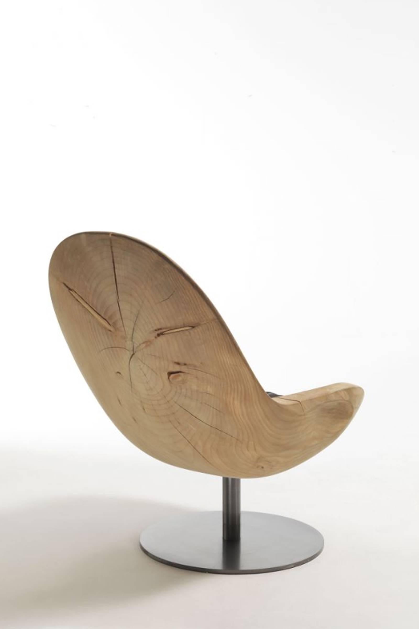 Carved Lory Cedar Armchair For Sale