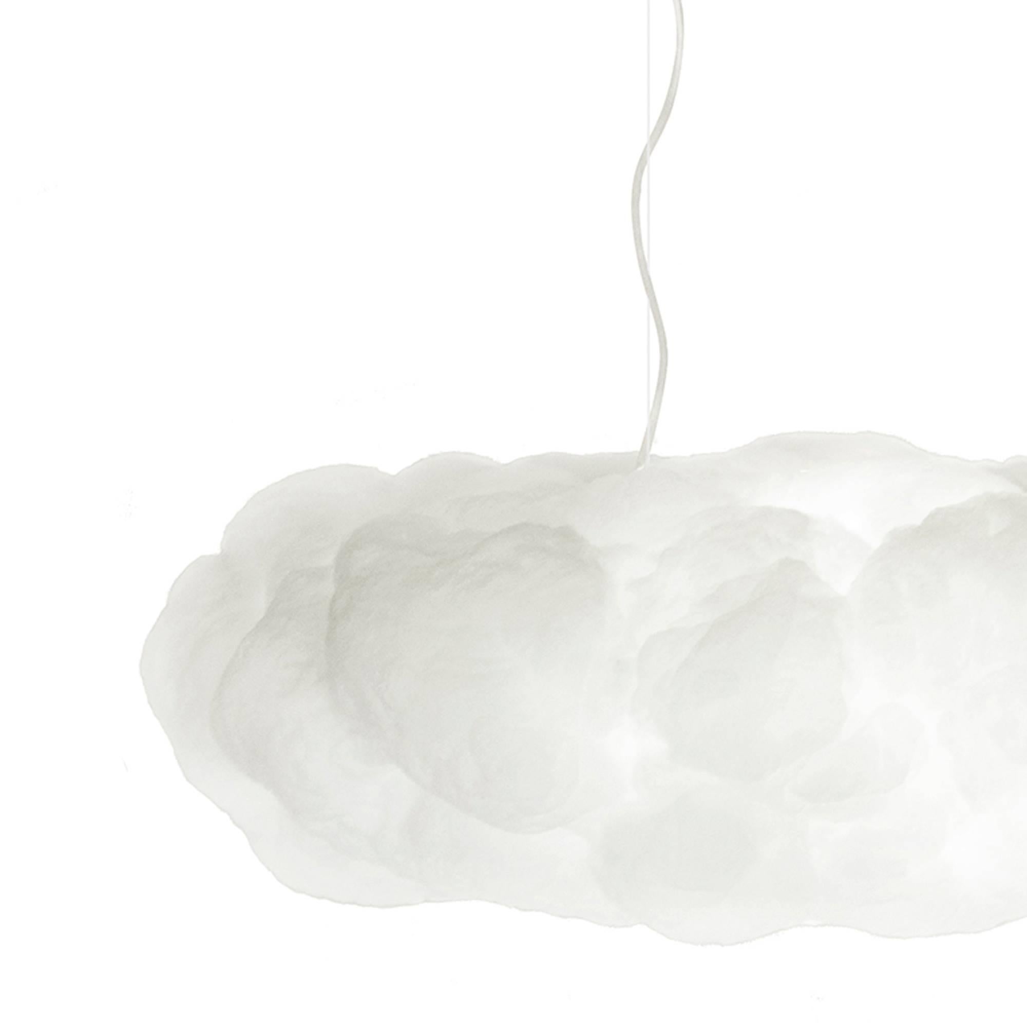 Cloudy chandelier lamp made with innovative material.
Several layers, fine coating with fire retardant.
Sound system and light inside controlled by a mobile apply or 
a remote with several options: choice of music, light effects
and sleep time.