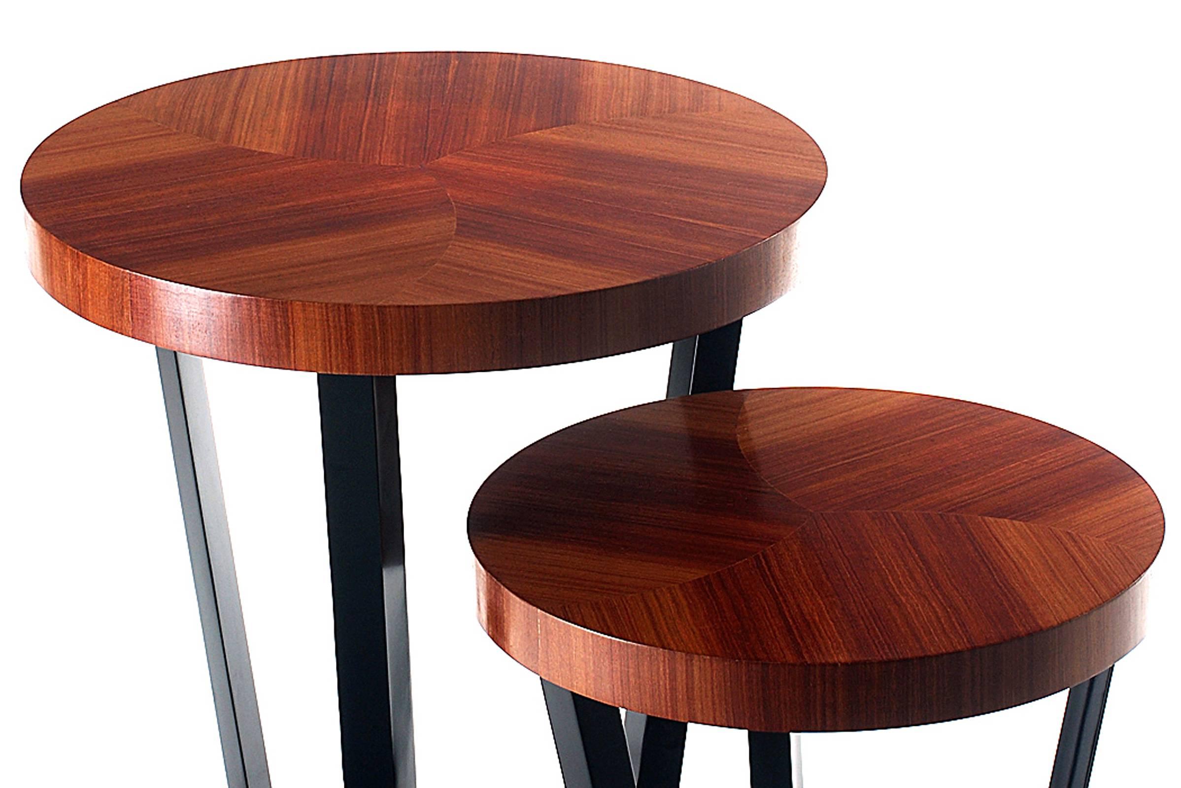 Side table designed set of two made from mahogany,
tops in palisander wood. Black lacquered and varnished
base. Also available with rosewood top.
L: Ø60xH60cm.
S: Ø40xH40cm.
