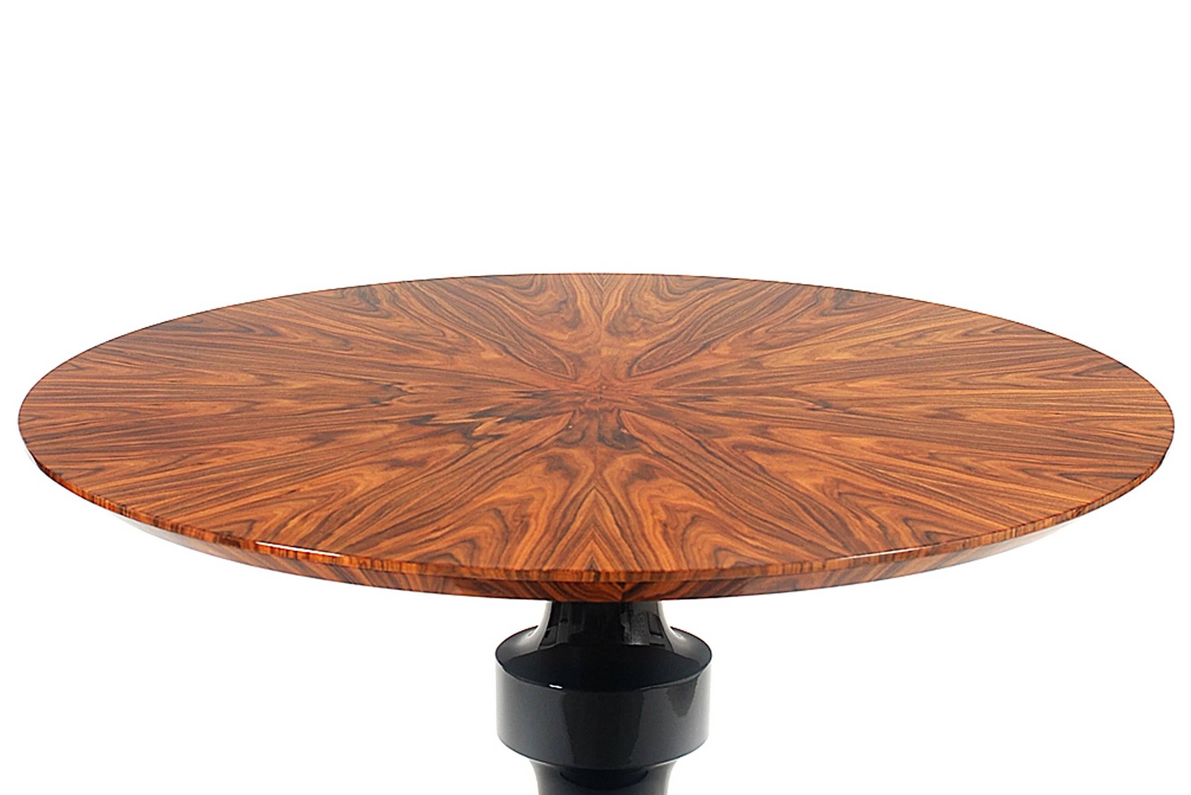 Coffee table chess is handcrafted solid wood.
Pedestal base with a radial matched wood.
Veneer of rosewood top.
