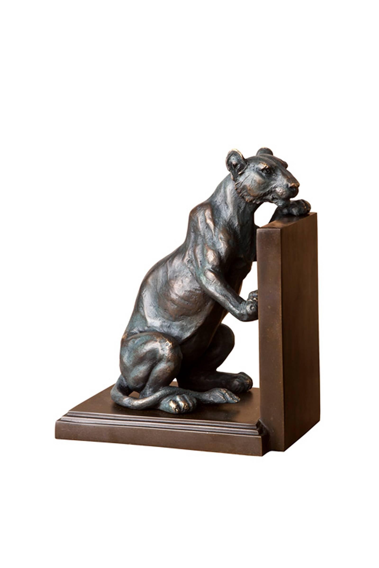 Set of Two Bookend lions in bronze and vintage brass.
