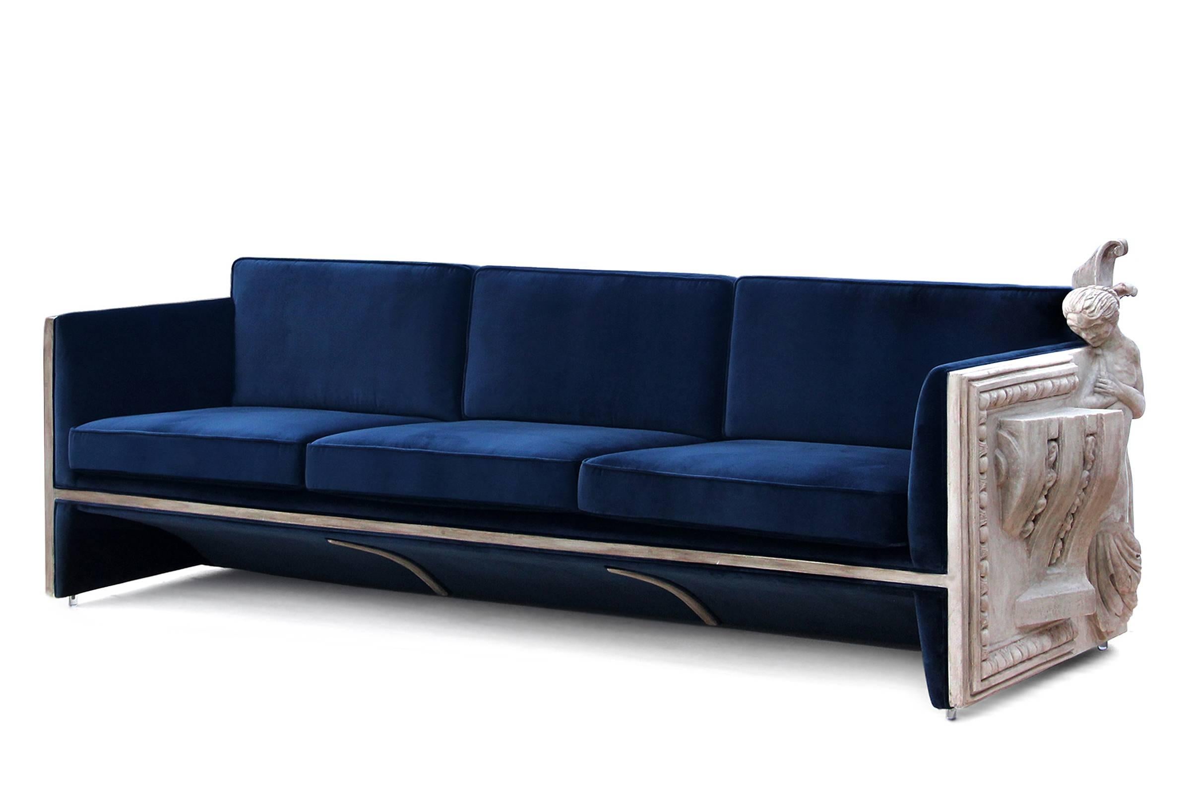 Sofa French castle wooden structure and sculpted panels,
in a manual sculpture, produced in resin and finished with restoration techniques similar to stone. Dark blue fabric finish. Exceptional piece.
