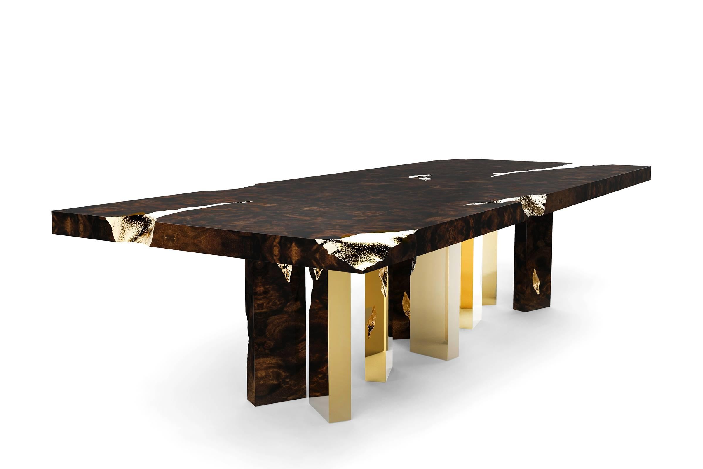 Dining table Majestic with solid mahogany coated in fine 
wood venner details are in polished brass and brass sheets. 
Exceptional piece. 


 