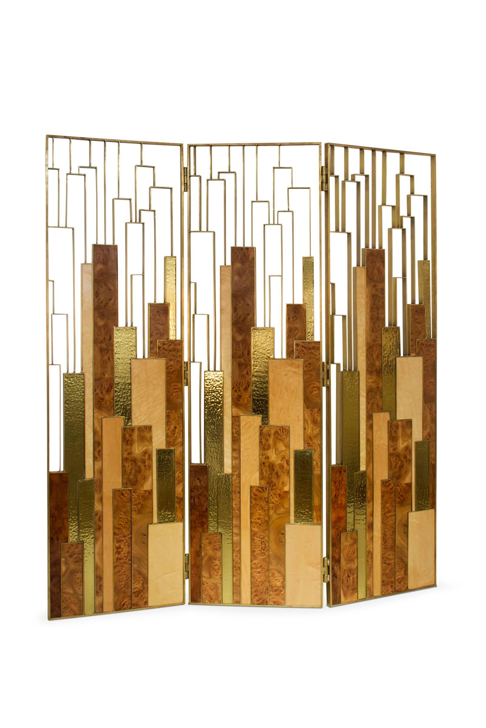 Screen gold elm root with polished brass structure
and panels in bird's eye wood veneer and elm root
wood veneer. Panels in polished hammered brass.
Exceptional piece. 
     
     