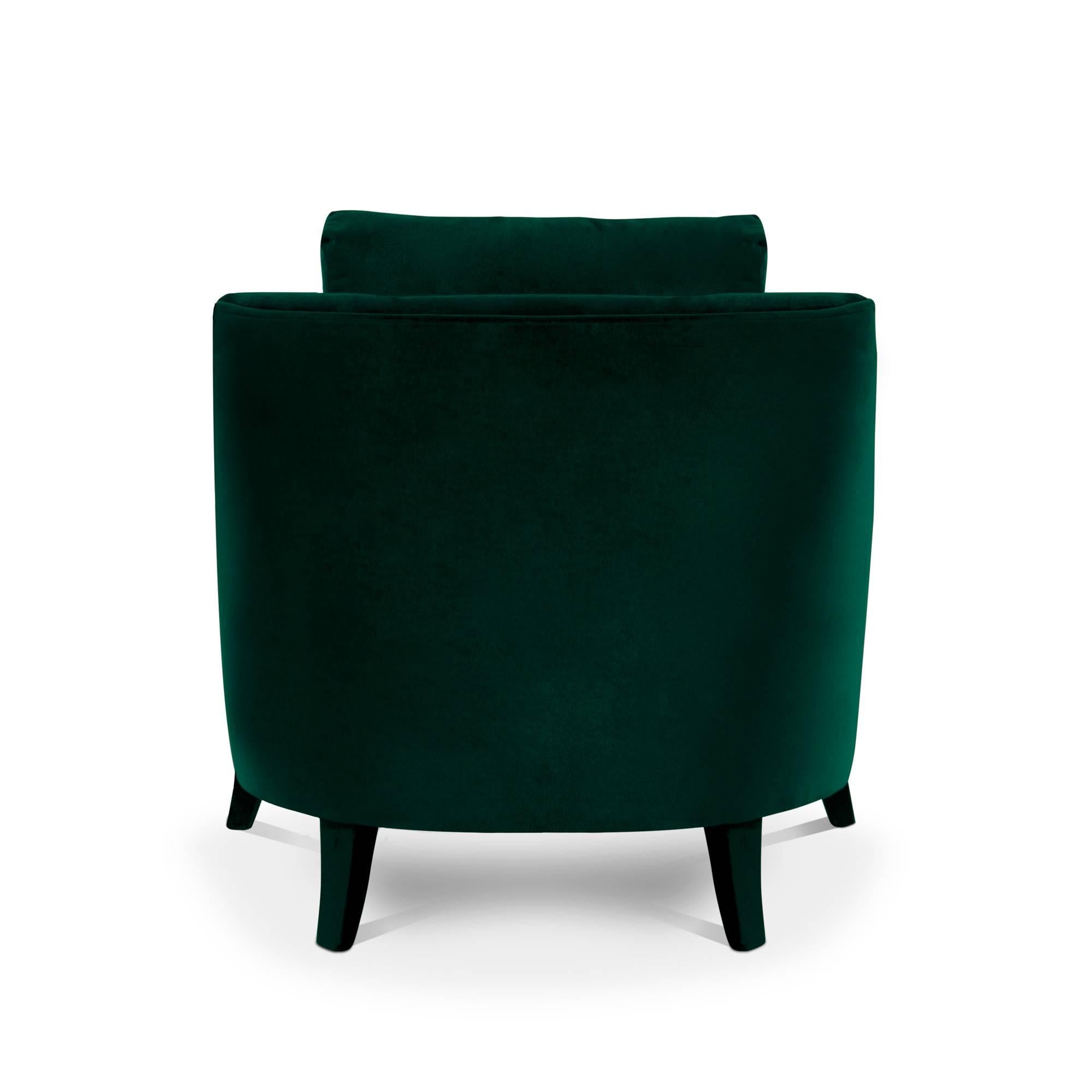 dark green velvet armchair