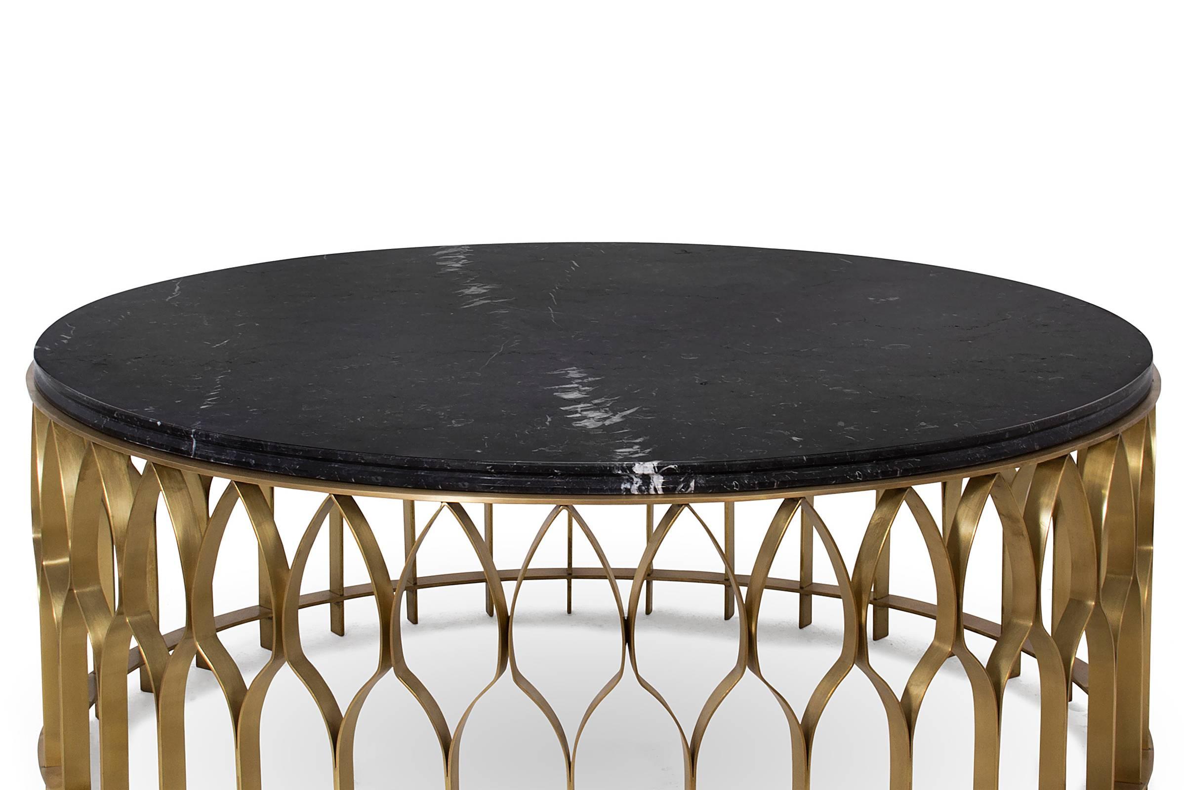 Round coffee table Arcade with brushed aged 
brass structure and marble Nero Marquina top.
Also available in Side Table Arcade.

