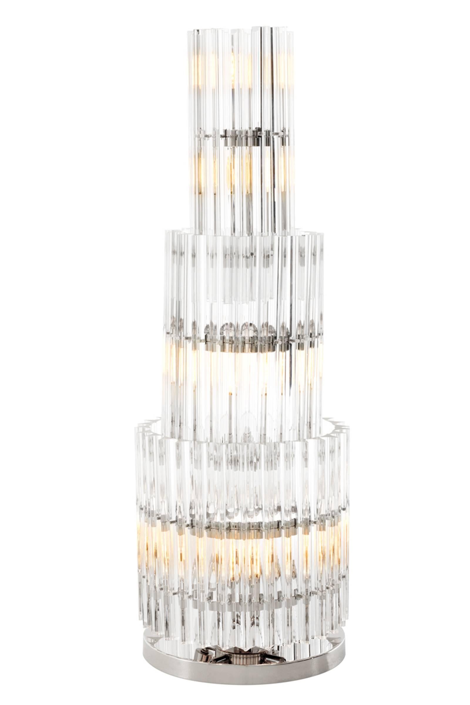 Table lamp Vegas with Nickel finish structure 
and clear glass bars.
Nine bulbs E14; 220/240V.
Available with steel brass finish and gold color 
glass and frosted glass.

 