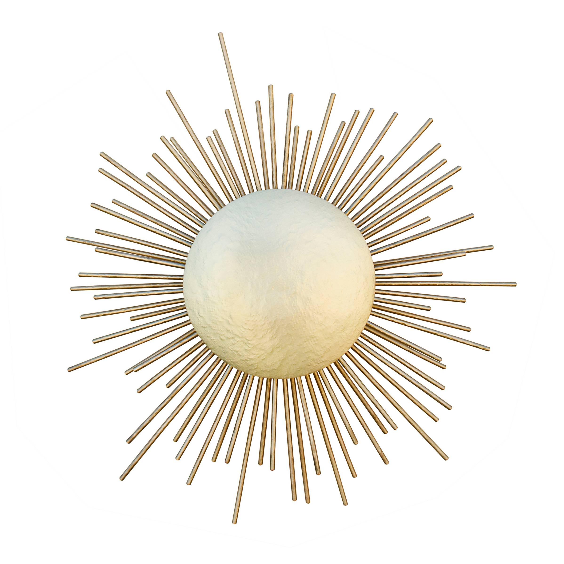 Wall light sunrise is in hammered brass and projects a
brightest light by the hammered brass rays as sunrise.
