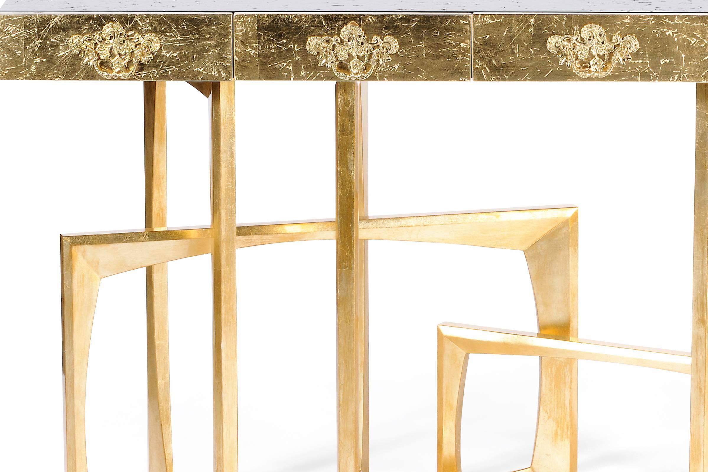 Console table gold frame with solid mahogany structure
hand-painted with gold leaf. Lacquered base in gold paint.
Available in black lacquered finish. Exceptional piece.

 