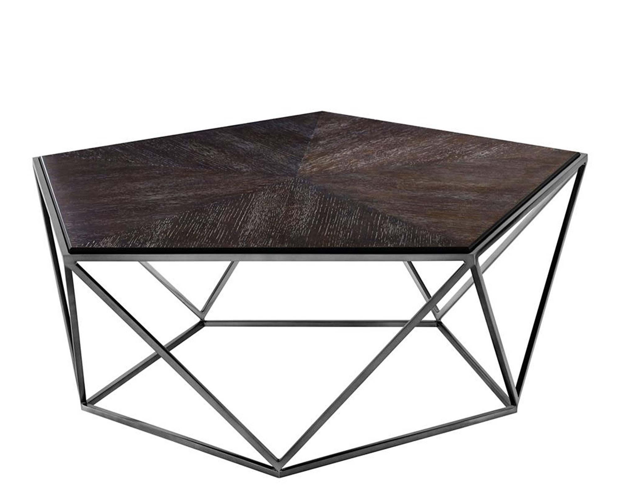 Coffee table penta with charcoal oak veener top
on black nickel finish base. Original piece for living or
office. 