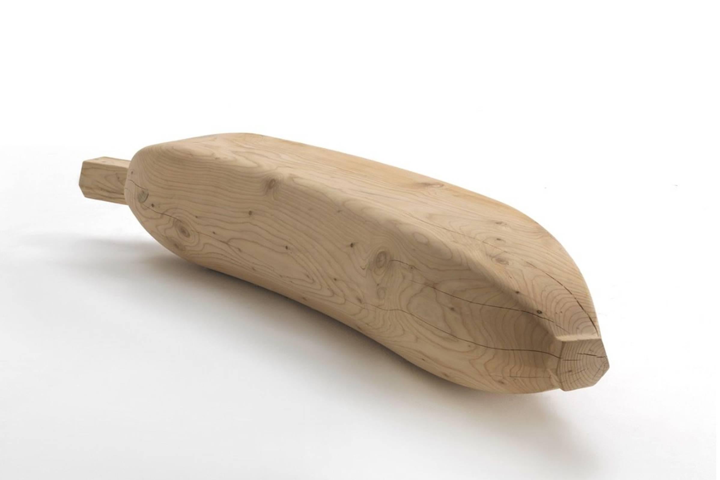 Bench banana carved in one block of
aromatic cedar wood. Original piece,
natural living with rare noble wood.
Available in burnt wood, price: 8900,00€.
Solid cedar wood include movement, 
cracks and changes in wood conditions, 
this is the essential
