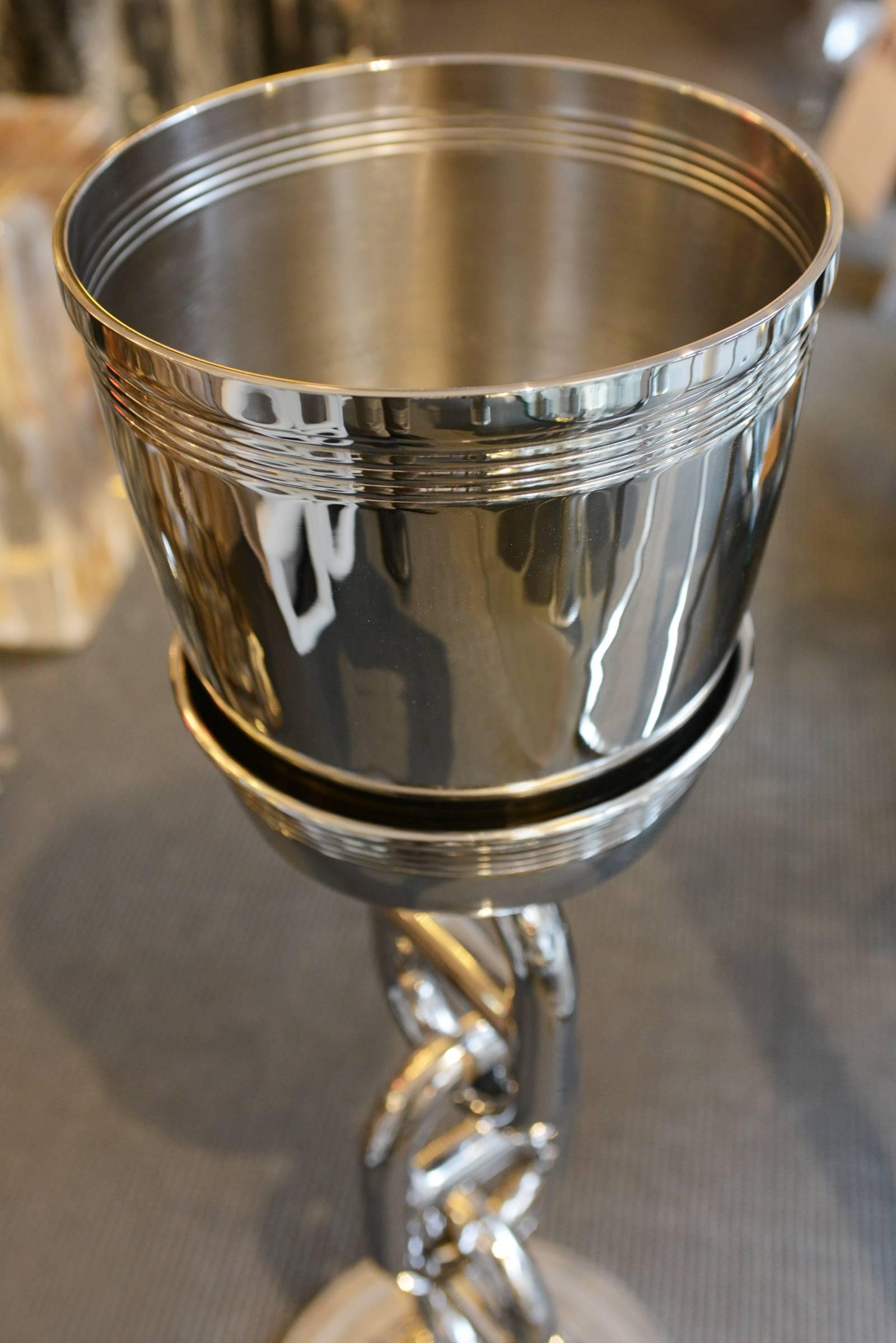 Wine cooler Hermes style on stand in polished
stainless steel. Ideal for yachting or living. In the style
of Hermes.