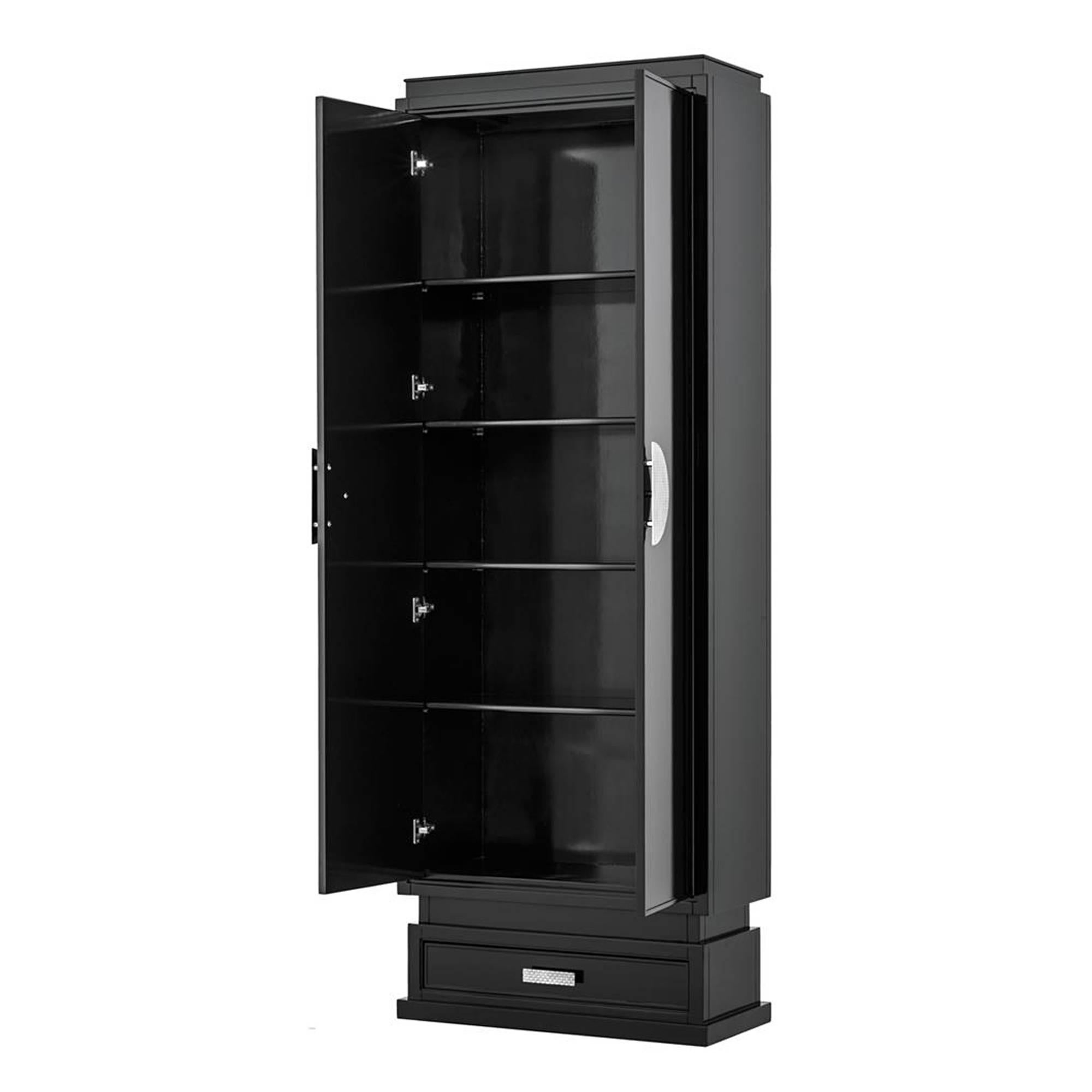 Cabinet or wardrobe Tokyo black made in
birchwood with black paint finish. Details in
Nickel finishes. Elegant and designed piece.
