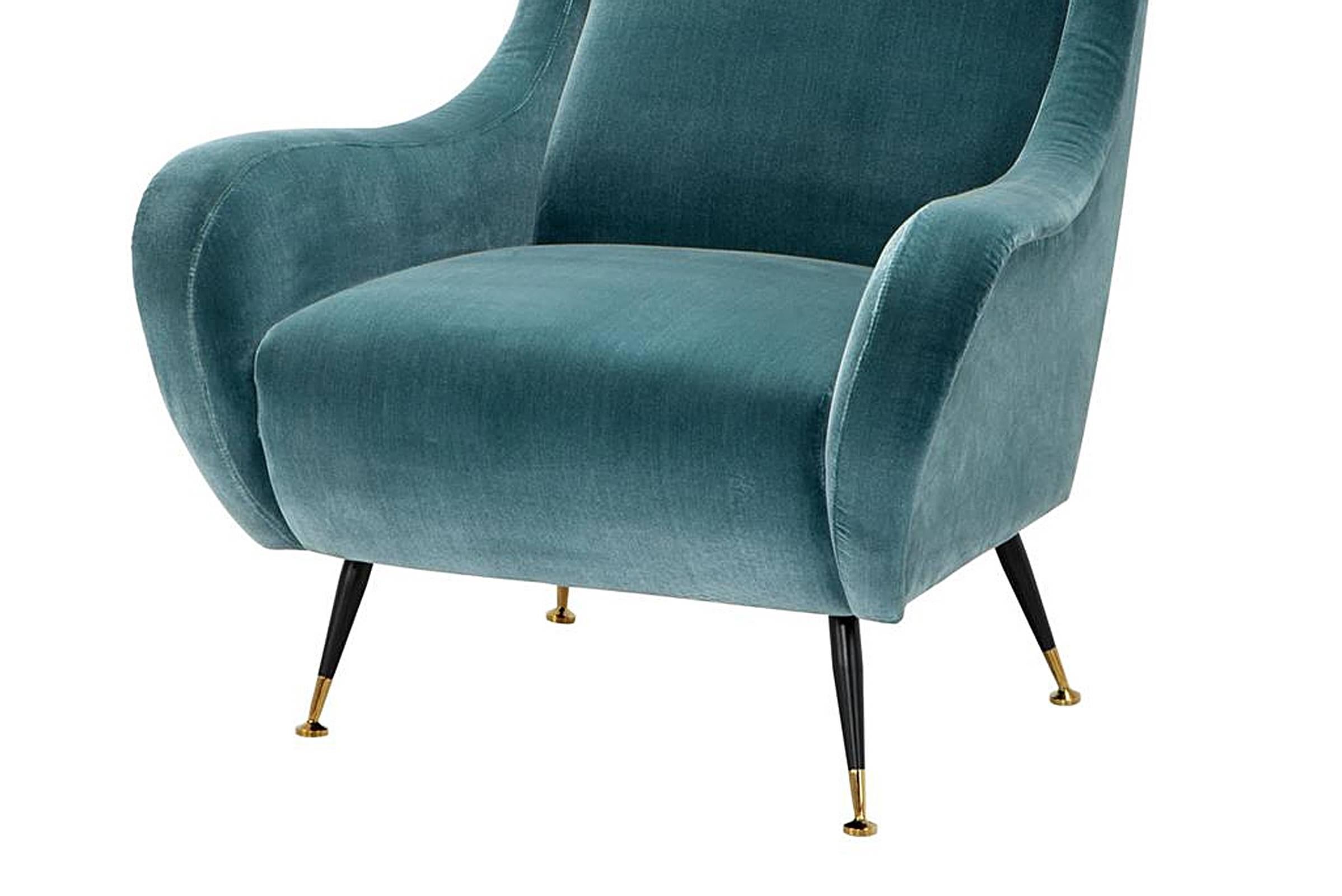 armchair with brass legs