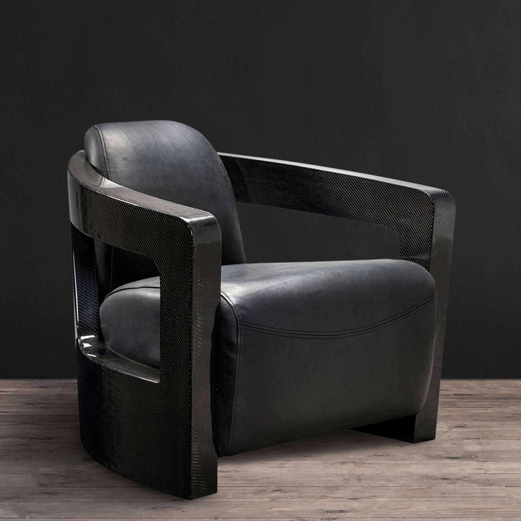 Armchair black carbon with black 
genuine leather, elegant rare piece.
