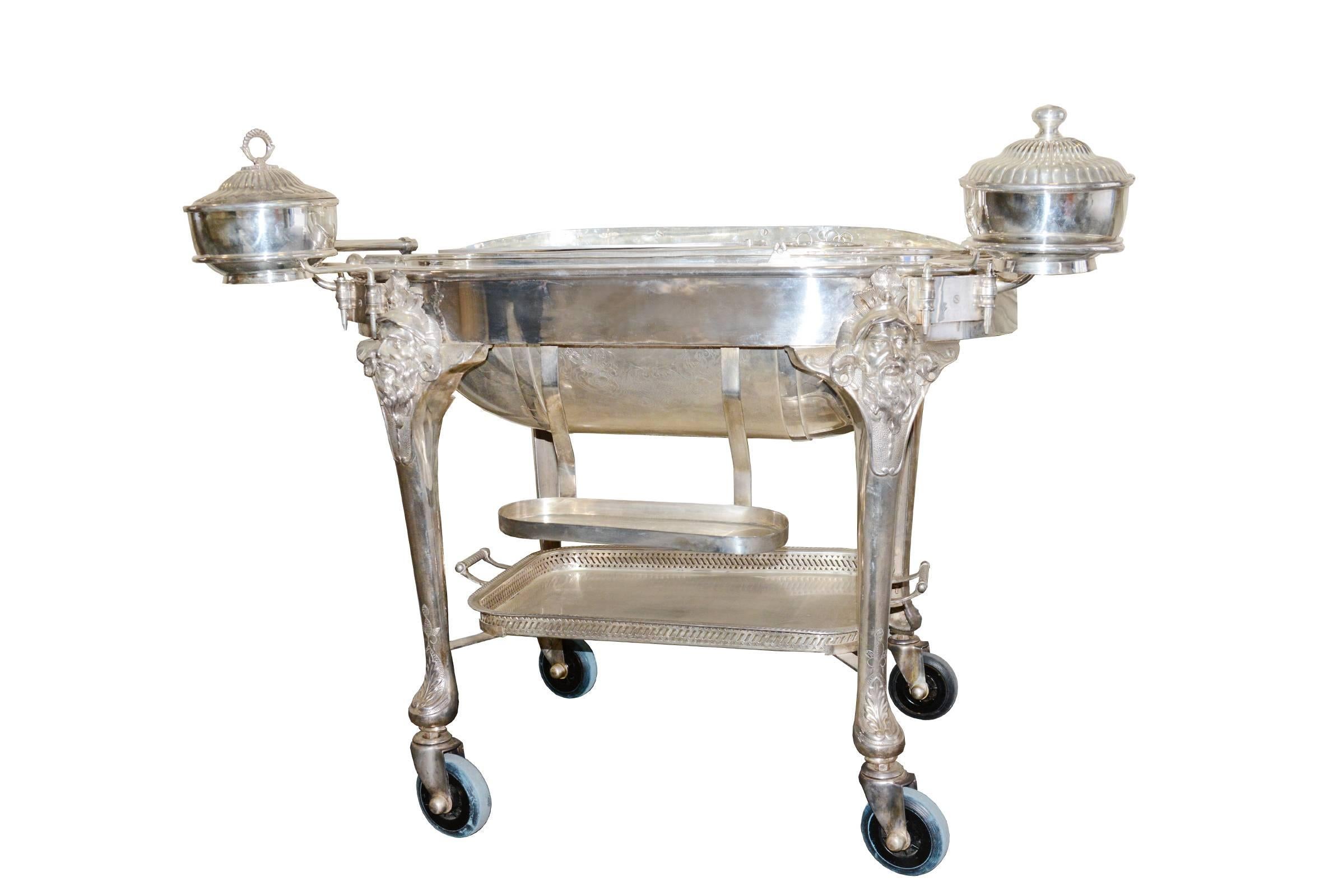 Trolley cutting table Royal Castle Sheffield EP,
for great restaurant too. Made in chiselled silvered bronze,
signed piece, as in the picture, on trolleys with three flats heat 
with alcohol to burnt, as in the picture. Silvered tray on base