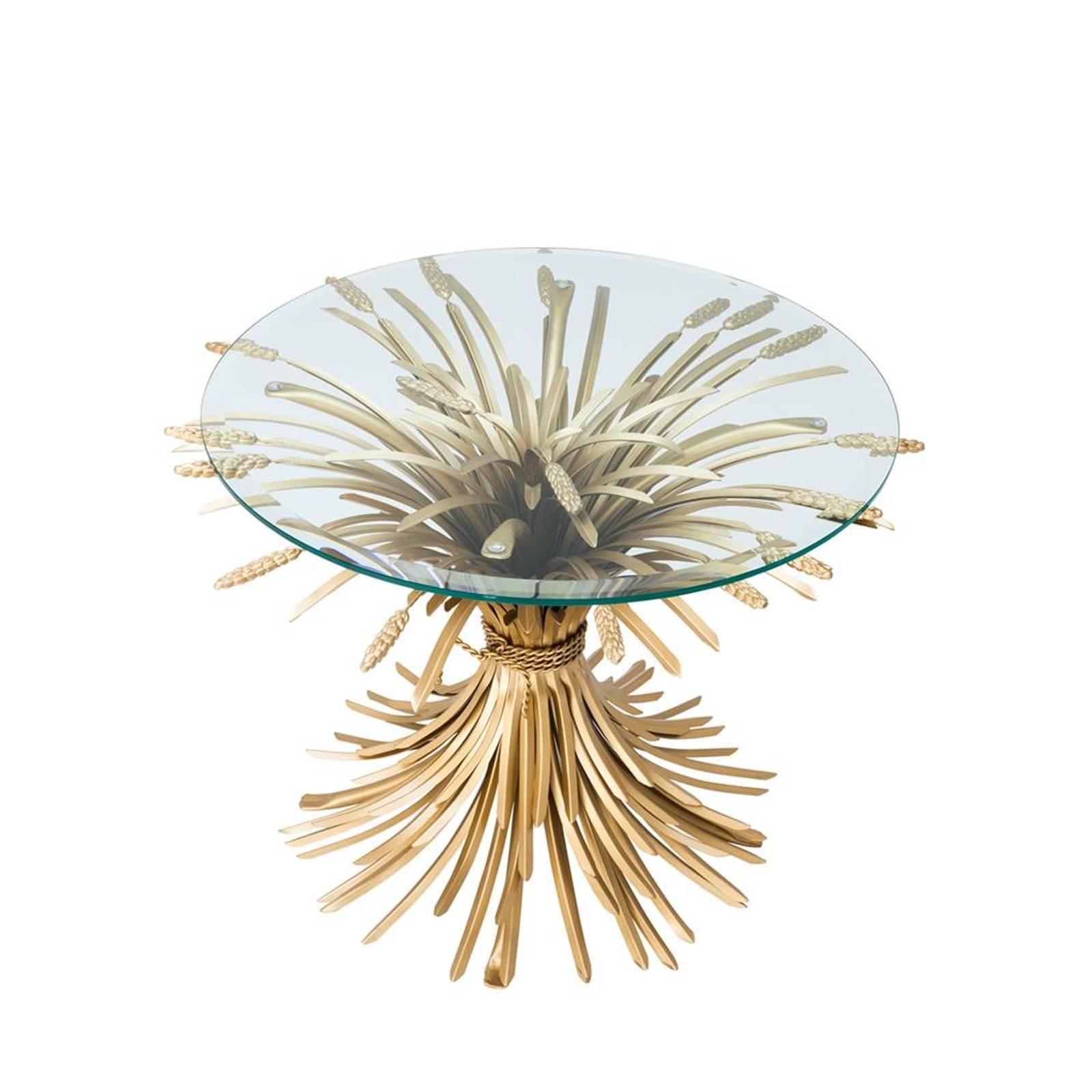 Side table wheat sheaf in antique gold finish
with bevelled clear glass top. Elegant and subtle
piece for living. Measures: Glass top Ø70cm. Price: 1990,00€.
Also available in coffee table wheat sheaf,
Measures: Ø90 x H43, glass top Ø90cm.