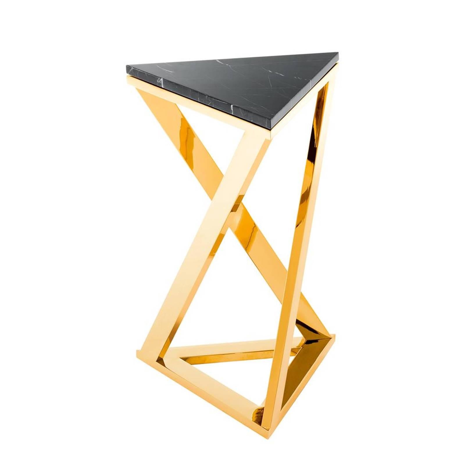 Side table ellipse with gold finish polished
stainless steel structure and black marble top.
Also available in stainless steel with black marble top.
