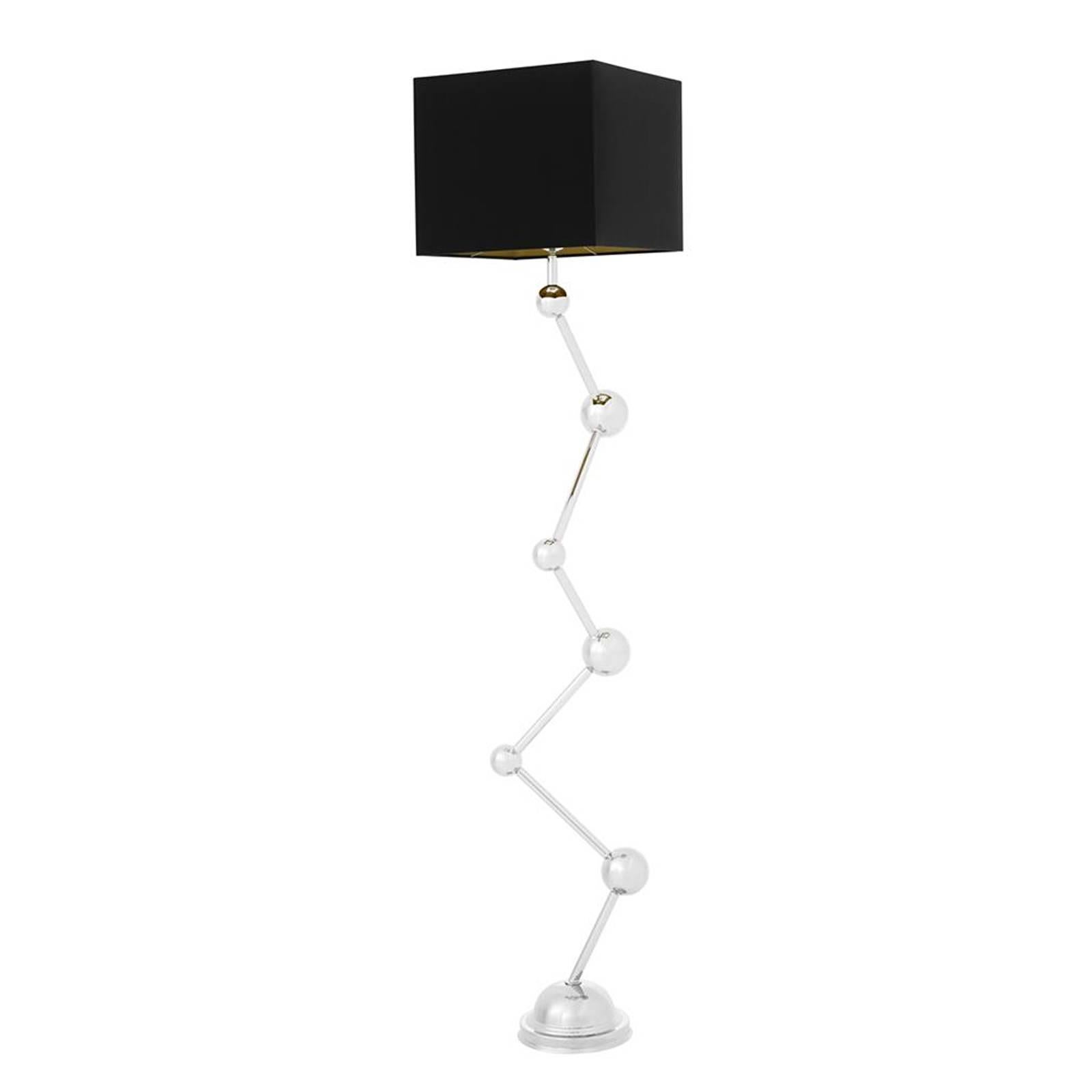 Floor lamp Astro in nickel finish
with black lampshade. One bulb lamp
holder type E27, maximum 40 Watt.
