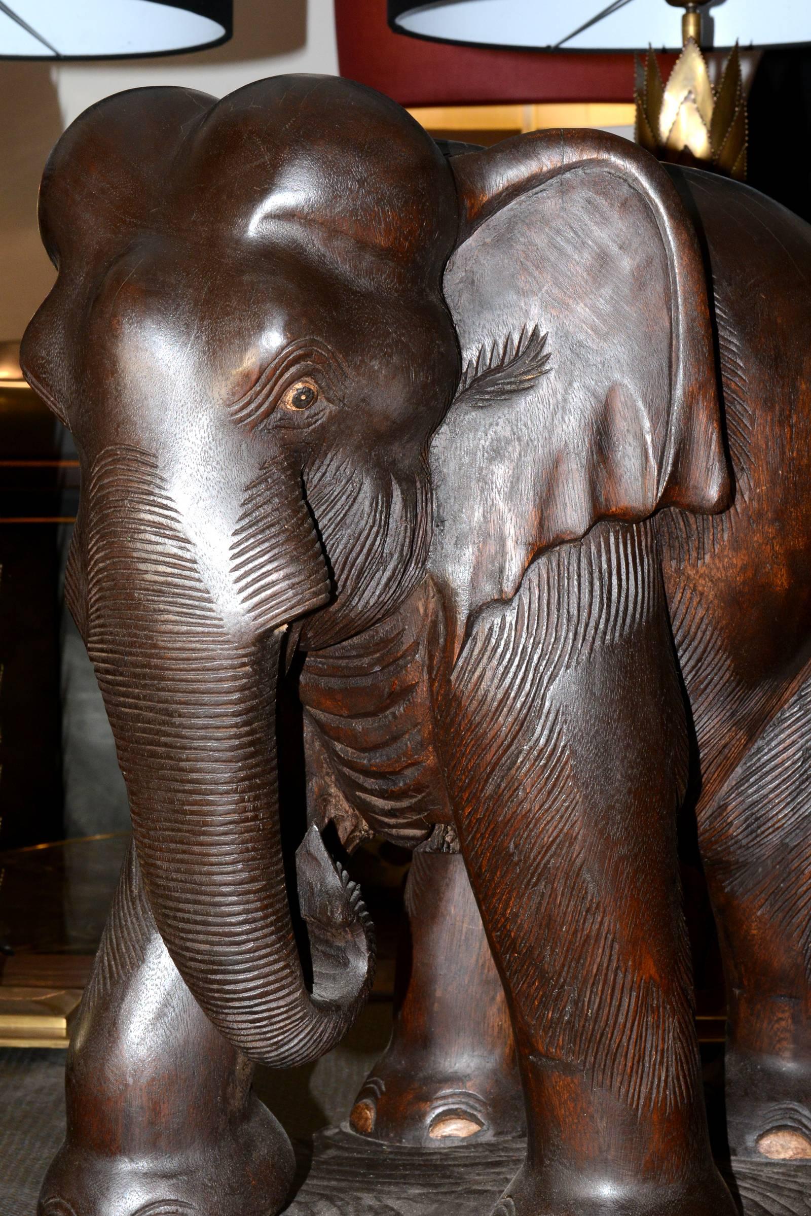 Sculpture elephant in hand-carved noble wood.

