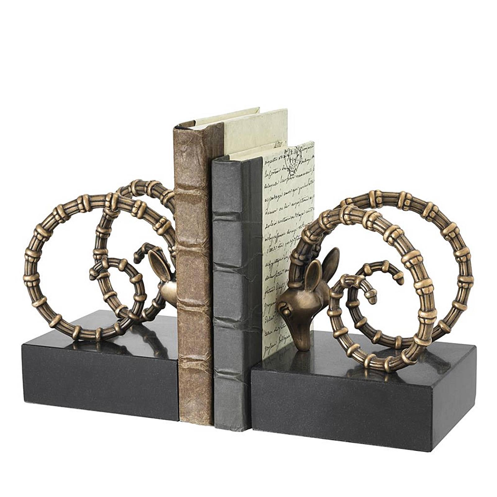 Bookends Calabra set of two in vintage brass 
finish with black granite base. Subtle piece.
Also available in nickel finish.
