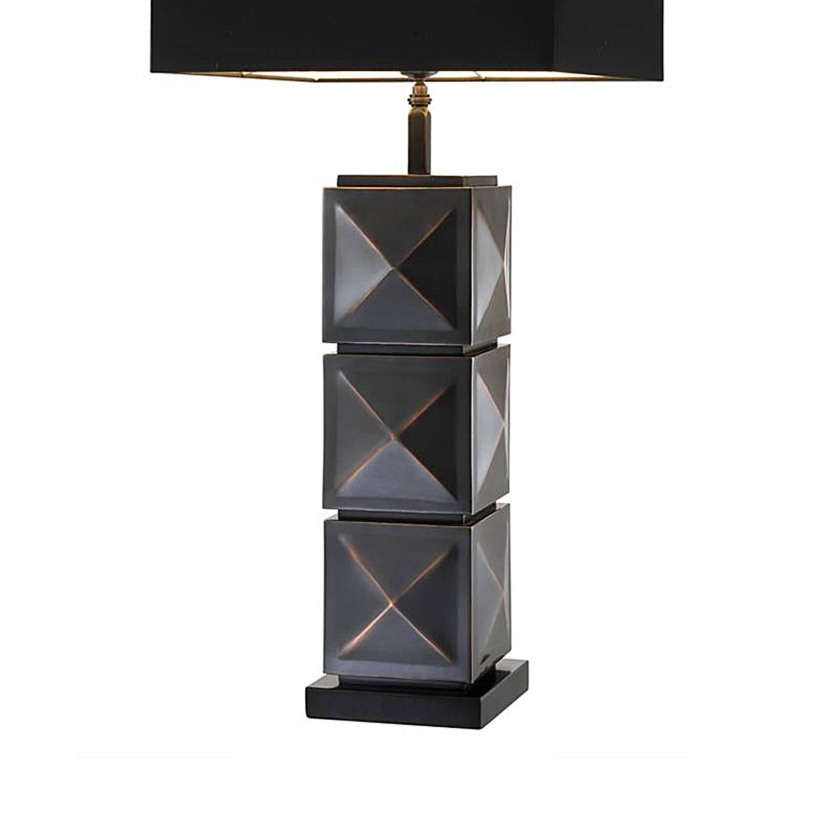 Table lamp Prisima in antique bronze finish,
on black granite base. With black lampshade:
40 x 40cm. Base 18 x 18cm.
One bulb lamp holder type E27, max 40 watt.
Bulb not included.
