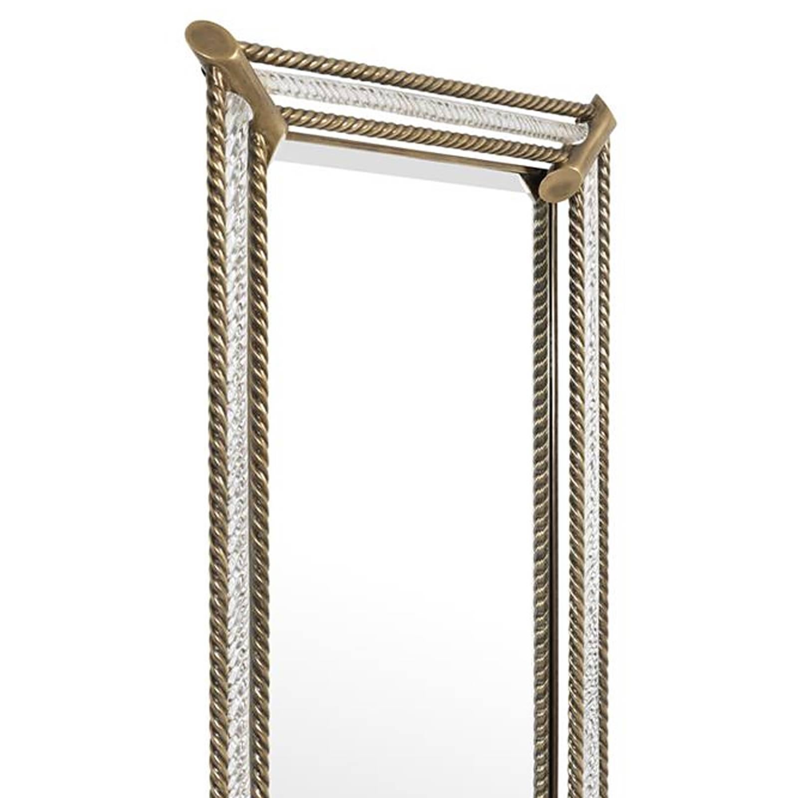 Mirror Torsade with handcrafted vintage 
brass frame. Mirror glass with bevelled sides.
