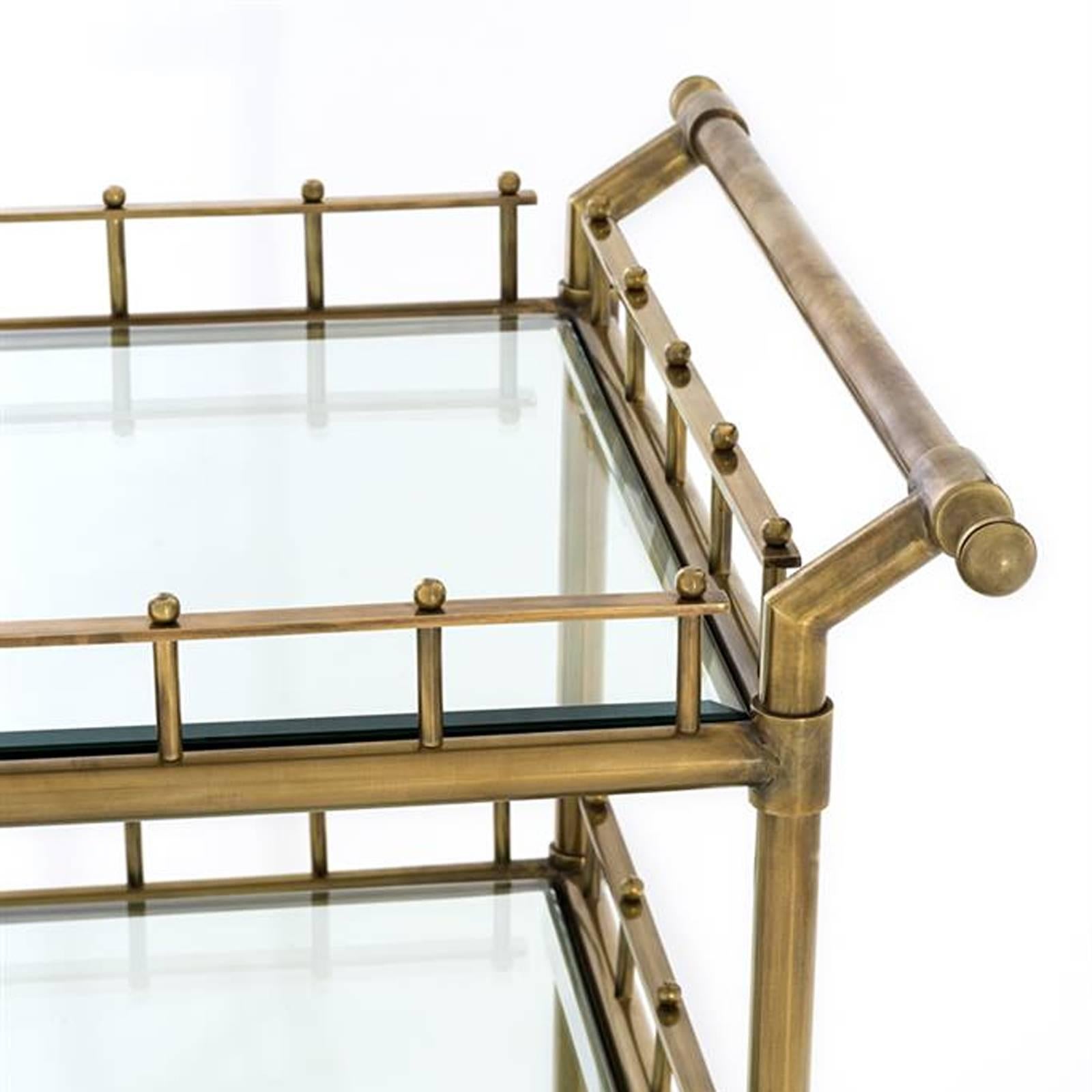 Trolley Queen with vintage brass structure and
with three bevelled clear glass top.
Also available in polished stainless steel with
three bevelled clear glass top.
