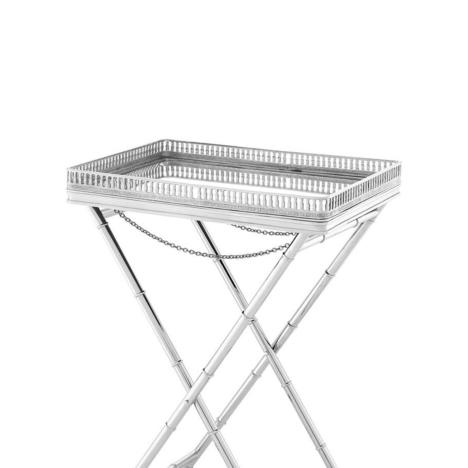 Butler tray chrome in polished nickel 
finish with bevelled mirror glass top. 
Price: 1750,00€.
Tray: L 61 x D 43 x H 7cm
All item: L 61 x D 43 x H 87.5cm.
Also available in gunmetal highlight finish.
Price: 1950,00€.
