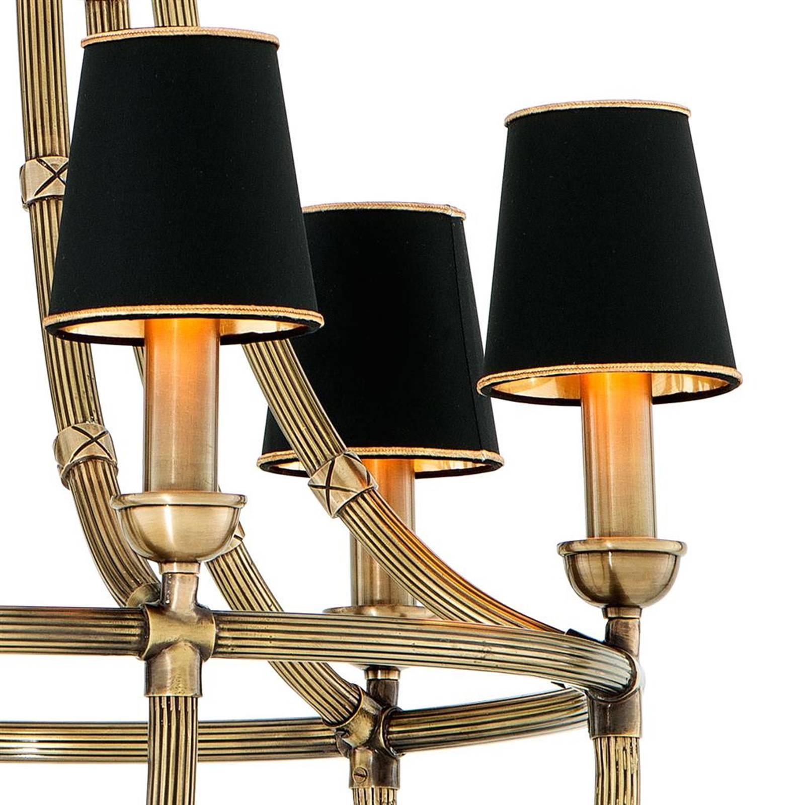 Chandelier Sherlock L with antique brass finish structure
with six bulbs lamp holder type E14, max 40 watt including 
Six black shades with gold trim. Bulbs not included.
Also available in antique silver plated finish or gunmetal 
bronze